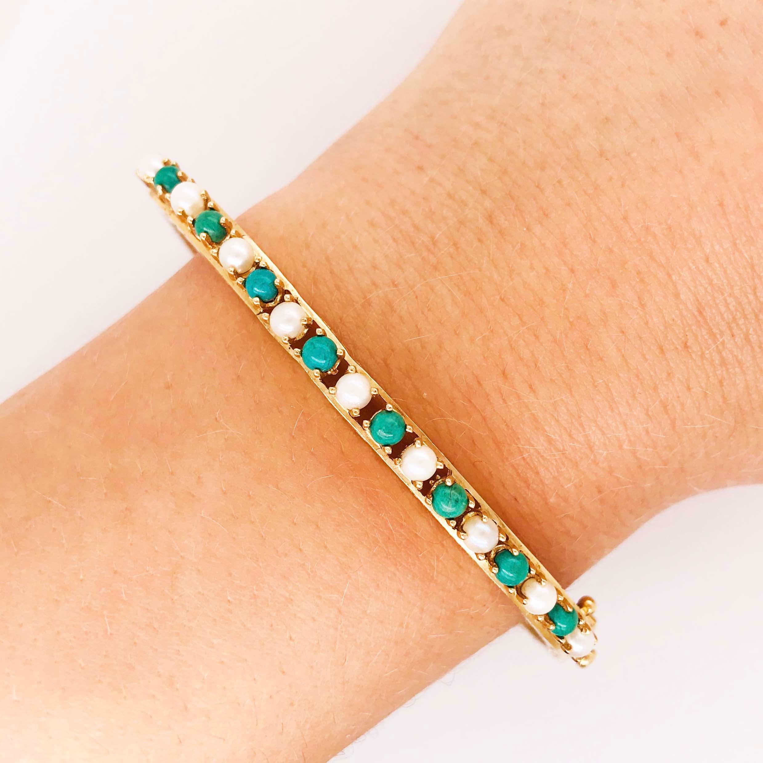 This antique bangle bracelet is a special piece. This piece was custom made by hand and is original with genuine cultures pearls and genuine amazonite and precious metal, 14K yellow gold. The handmade pearl and amazonite bangle is an oval bangle