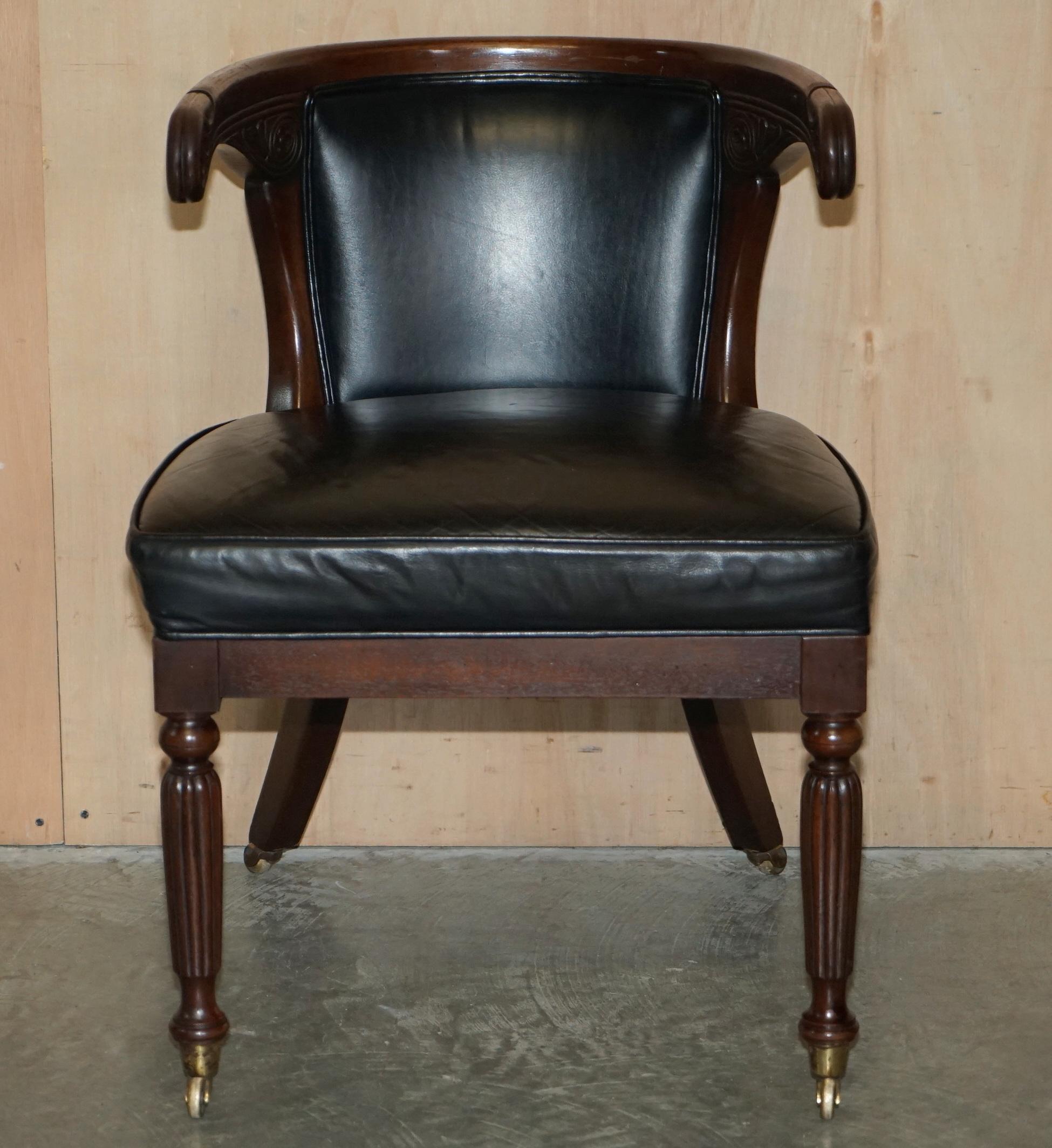 We are delighted to offer for sale this exquisite original circa 1815 Black leather Regency office chair with sculpted Horseshoe frame

What a chair! I have never seen another like it, the frame is traditional Regency and looks important and