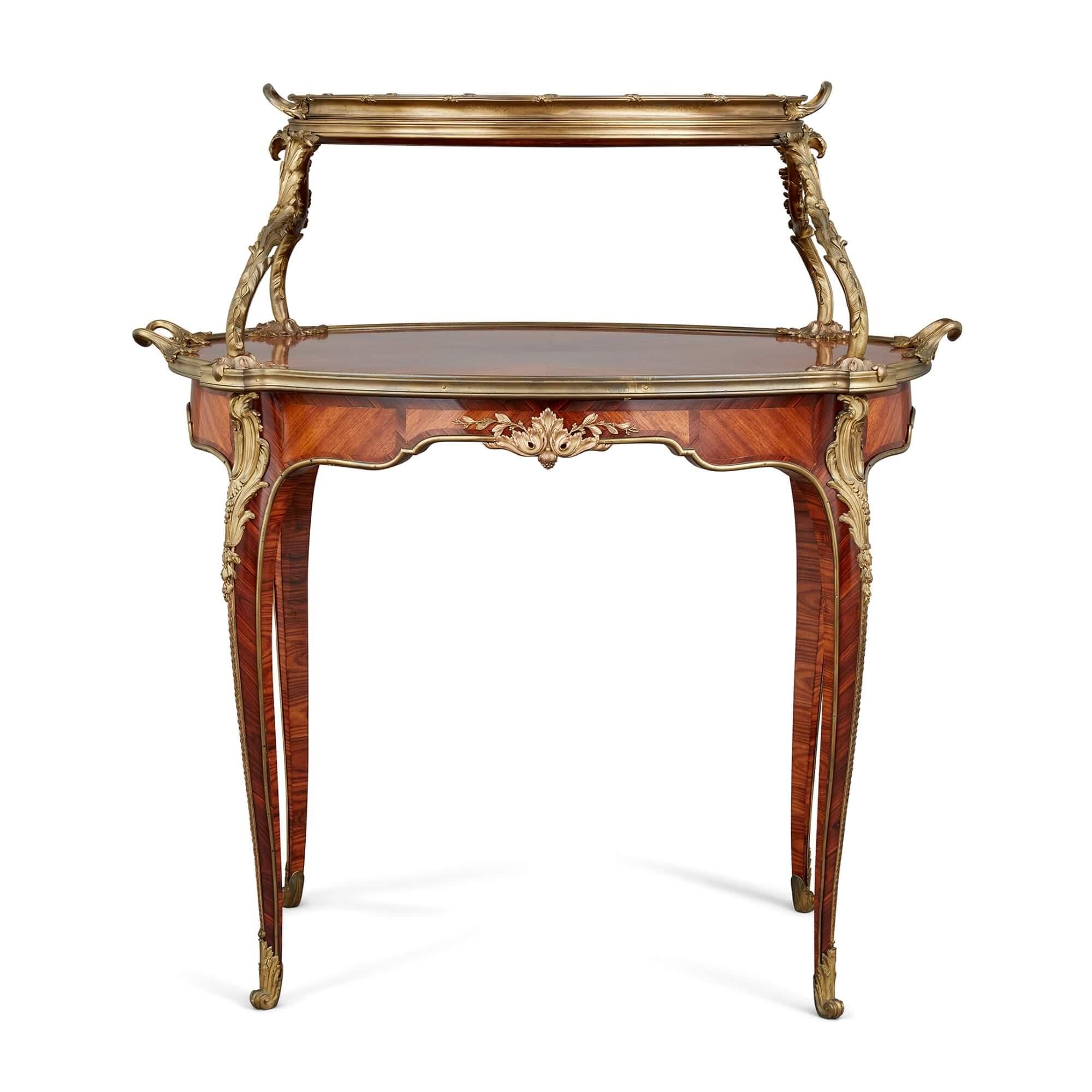 Antique ormolu mounted tea table attributed to Paul Sormani 
French, Late 19th Century 
Height 94cm, width 88cm, depth 55cm 

Traditionally used for the display and serving of tea and owned by the elite, the tea table in Mayfair Gallery’s collection