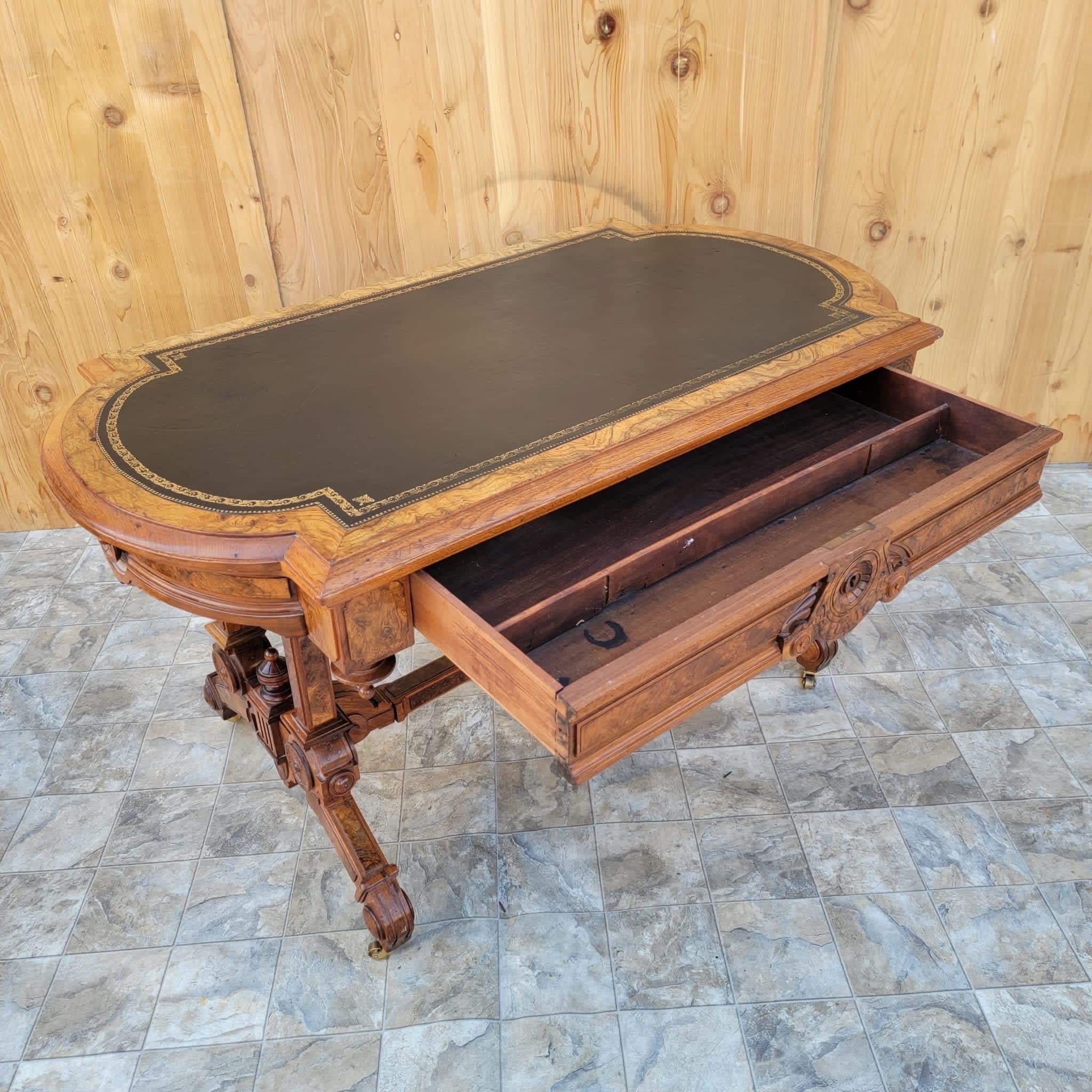 Antique Ornate Carved Eastlake Leather Top Writing Desk In Good Condition In Chicago, IL