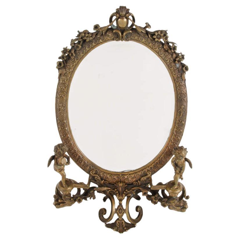 Antique Ornate Cast Metal Vanity Mirror with Cherubs For Sale