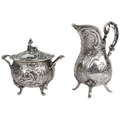 Antico set di lattiere e zuccheri in argento 800 tedesco ornato di J. Riemann