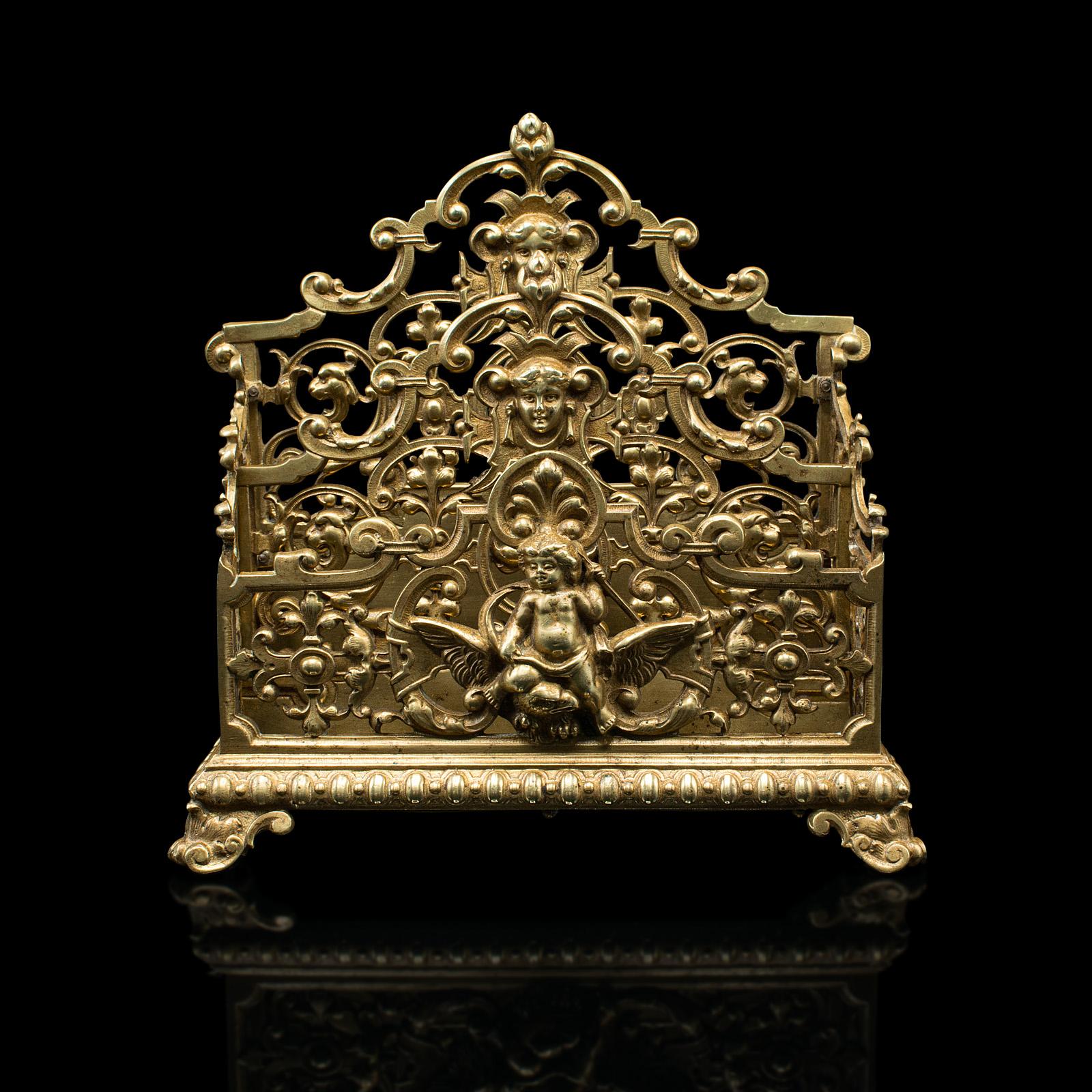 This is an antique ornate letter rack. An Italian, gilt metal stationery stand or desk tidy, dating to the late Victorian period, circa 1900.

Striking Continental taste with classical decoration
Displays a desirable aged patina and in good