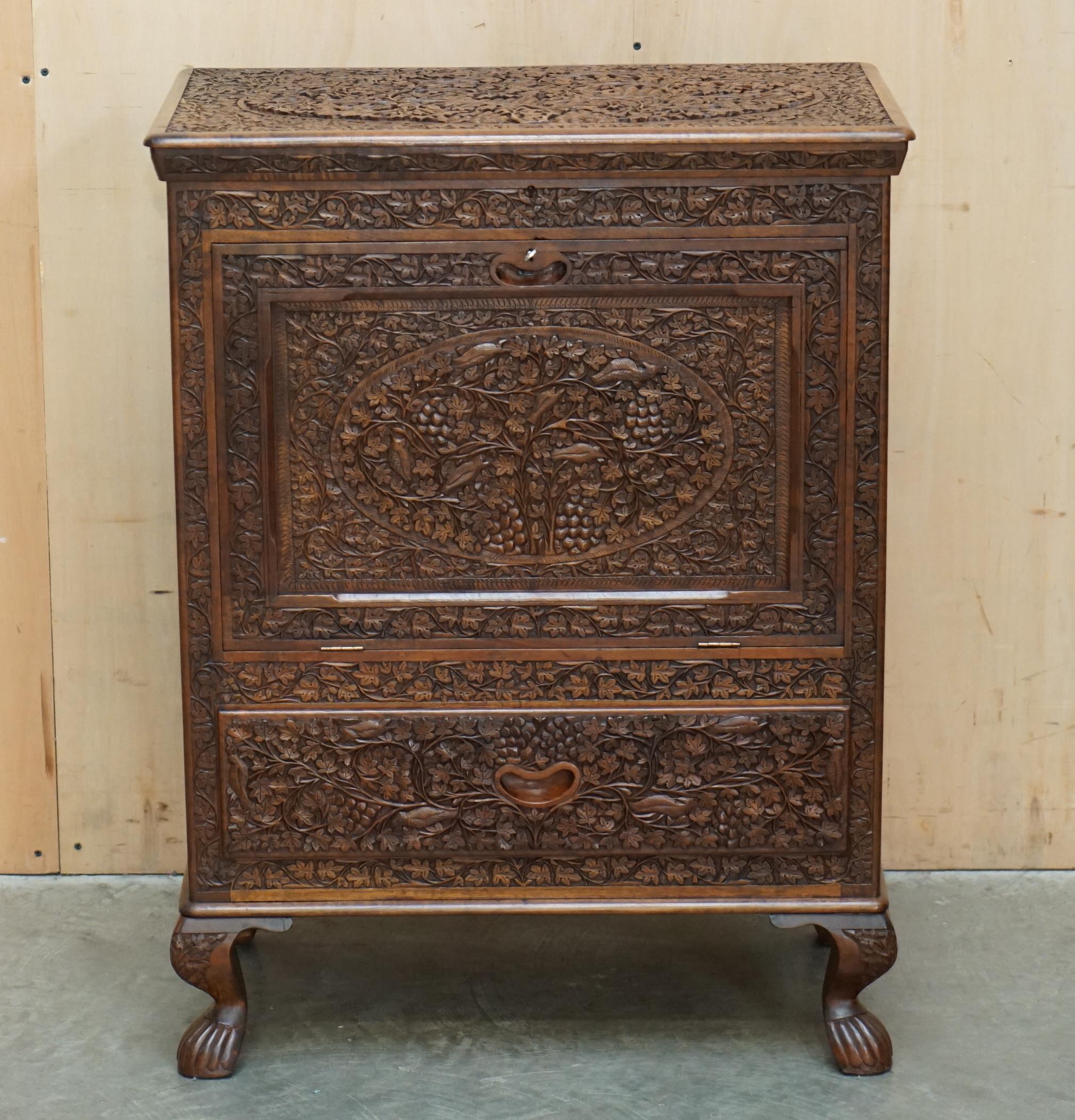 Royal House Antiques

Royal House Antiques is delighted to offer for sale this stunning Antique circa 1910 British Colonial Burmese ornately carved Rosewood drinks cabinet with original key 

Please note the delivery fee listed is just a guide, it