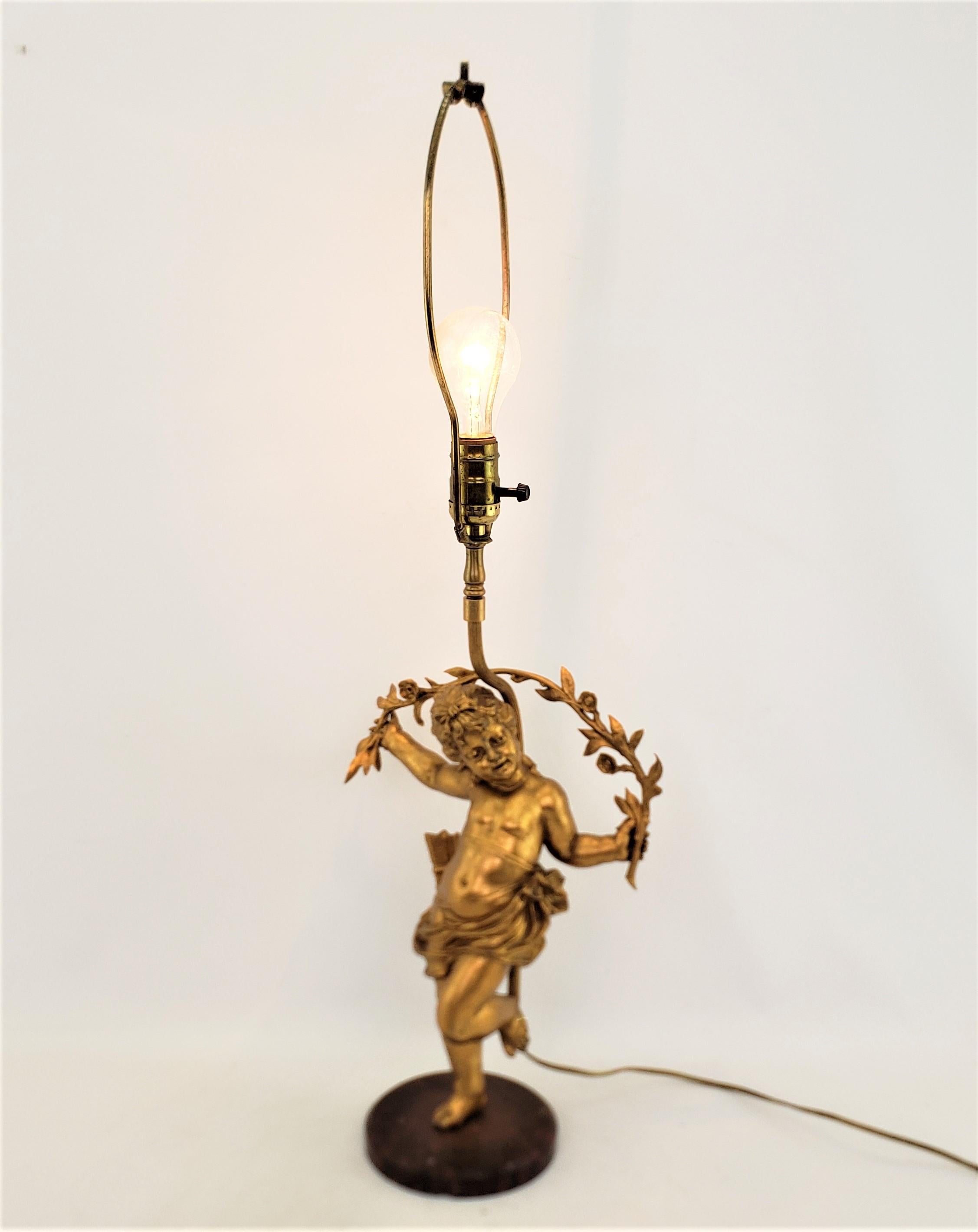 Italian Antique Ornately Cast & Gilt Finished Sculptural Cherub Table Lamp For Sale
