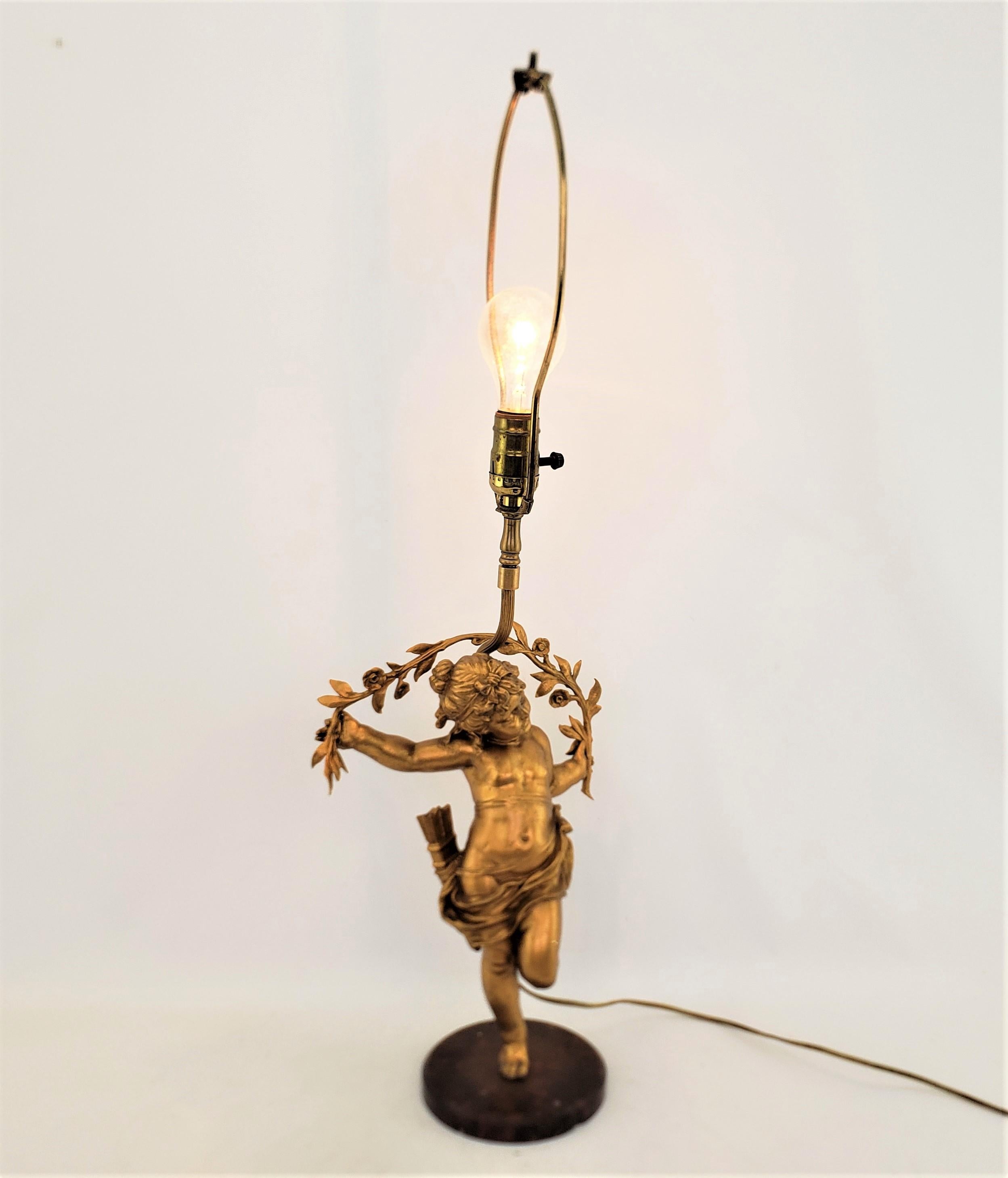 20th Century Antique Ornately Cast & Gilt Finished Sculptural Cherub Table Lamp For Sale