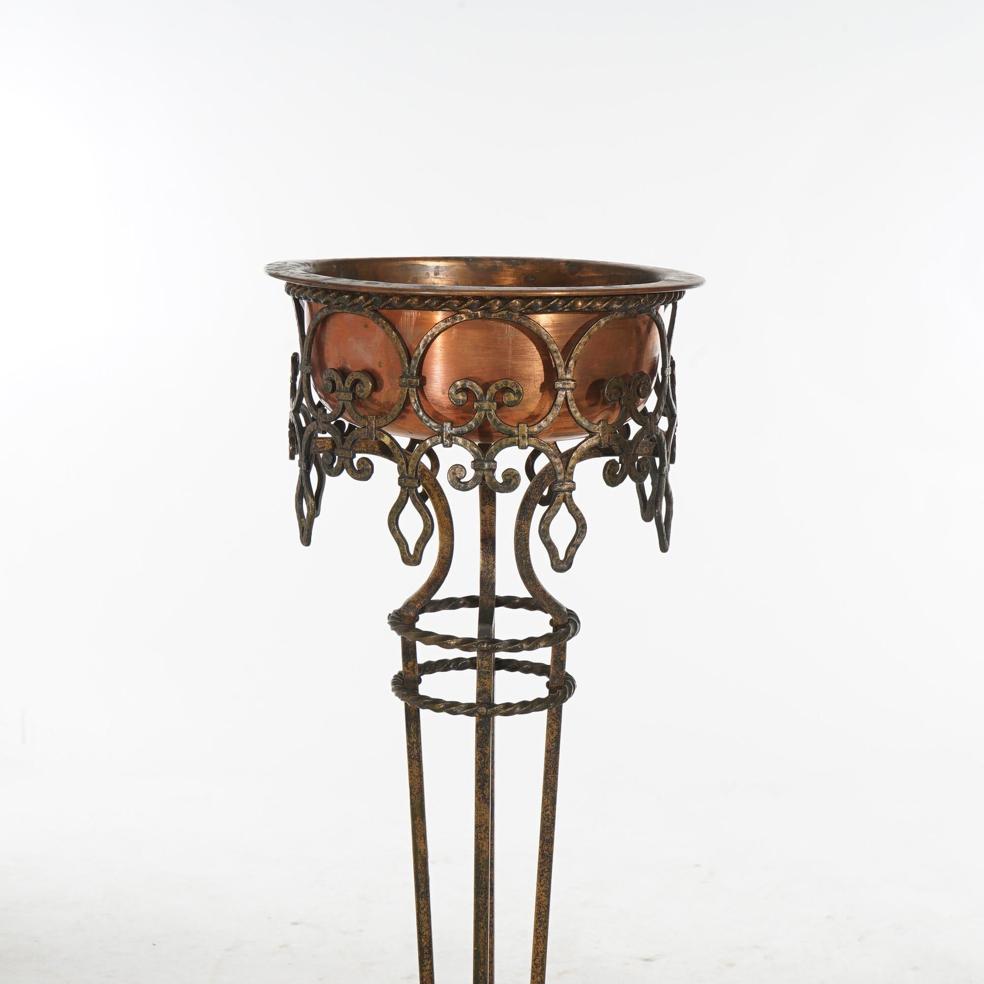 ***Inquire About Reduced In-House Delivery Rates - Reliable Professional Service & Fully Insured***

Antique Arts & Crafts Oscar Bach Wrought Iron & Copper Plant Stand with Foliate Elements C1910

Measures - 44.25