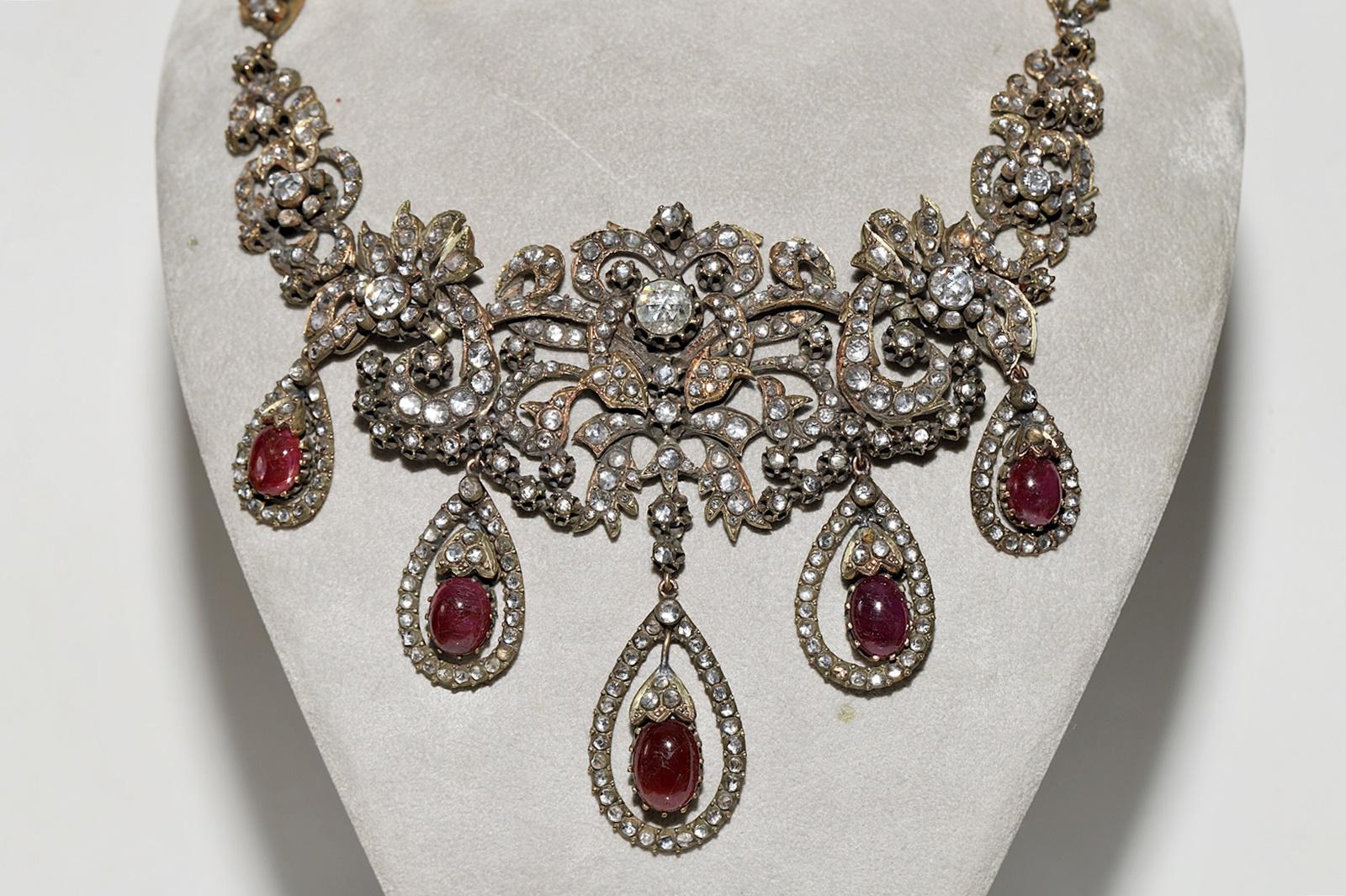 In very good condition.
Total weight is 102.4 grams.
Totally is diamond about 20 ct.
Totally is ruby 28 ct.
Total lenght is chain 32 cm.
Acid tested to be 8k real gold.
Please contact for any questions.