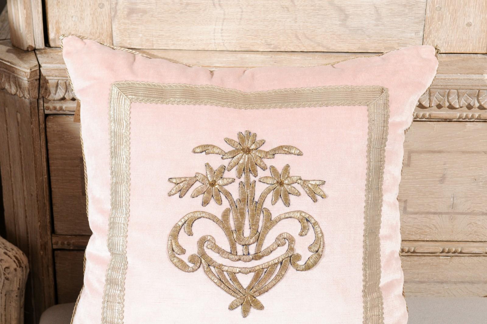 An antique Ottoman Empire silver metallic floral embroidery on brush pink velvet made into a throw pillow. We currently have two pillows available, priced and sold individually. Made of an exquisite antique Ottoman Empire silver metallic embroidery