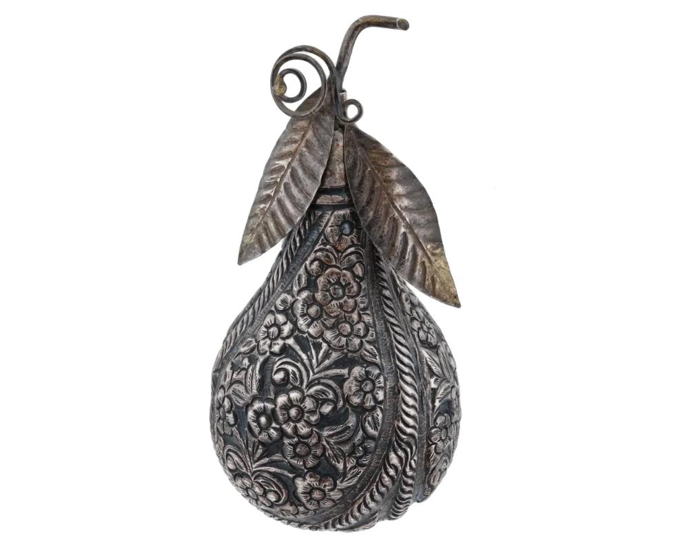 An antique Turkish, Ottoman Empire, Silver rosewater sprinkler bottle. The pear shaped bottle is adorned with engraved floral and foliage designs and a removable lid with an elongated stem tube featuring sculpted leaves with scrolls. Antique