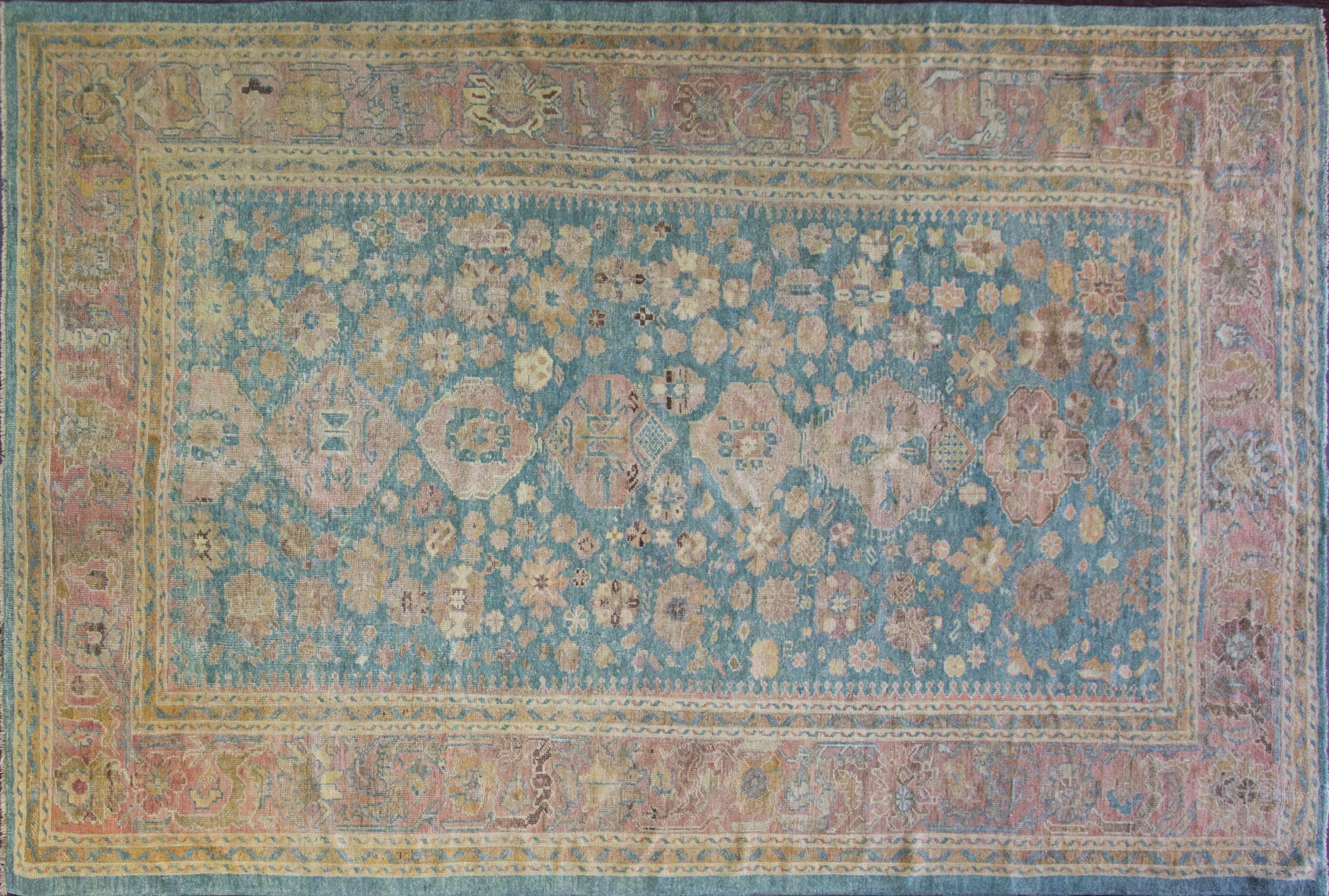 Pleasant and amazing antique Oushak carpet with unique colors and excellent size with great fine weave. Measures: 8'6