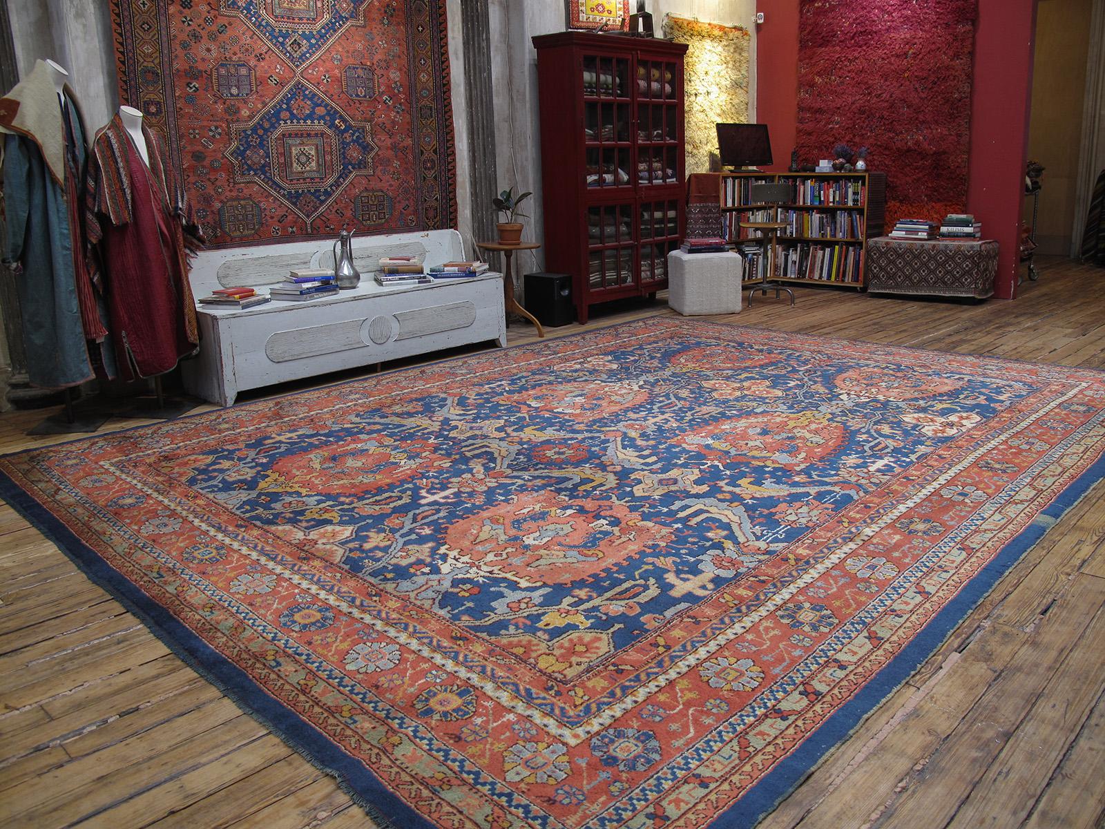 A beautiful antique carpet from the prolific Oushak region in Western Turkey, featuring a well-known design, at least since the seventeenth century. The design is often referred to as 
