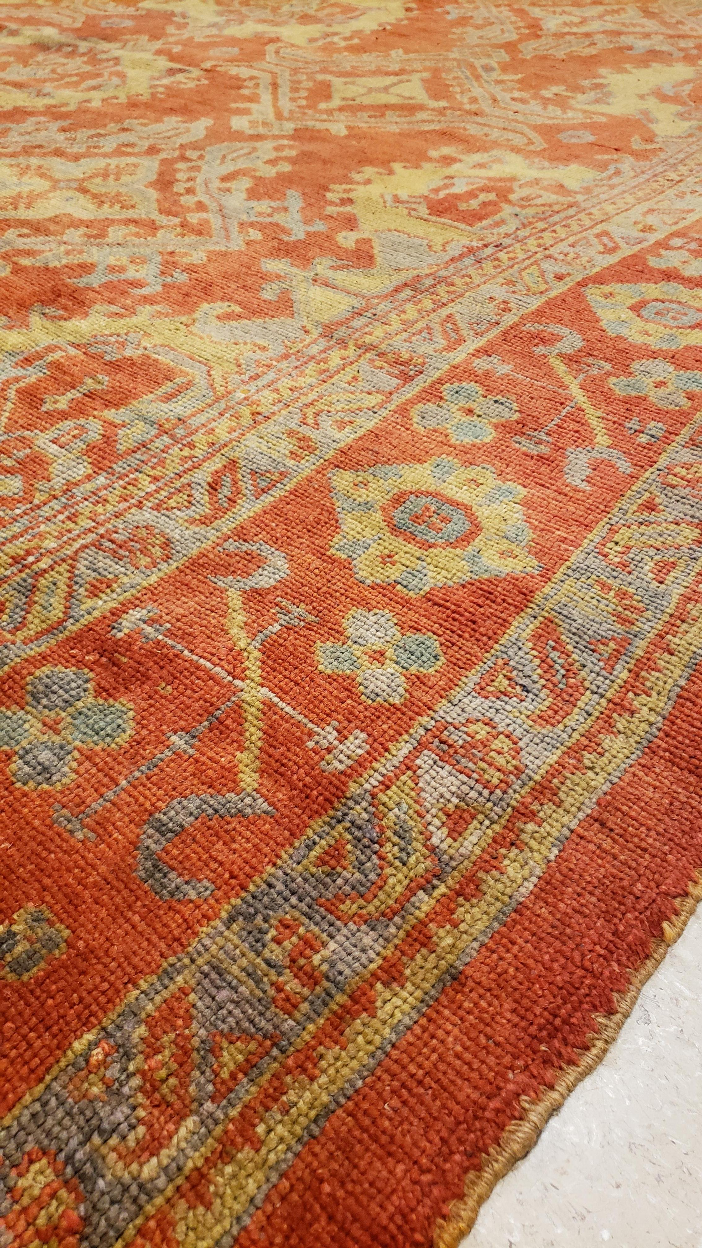 Turkish carpet from Oushak with a combination of soft colors on a all-over design. Finely woven, having the most superb wool found in the mountains of Anatolia.
Measures: 12' x 14'6
