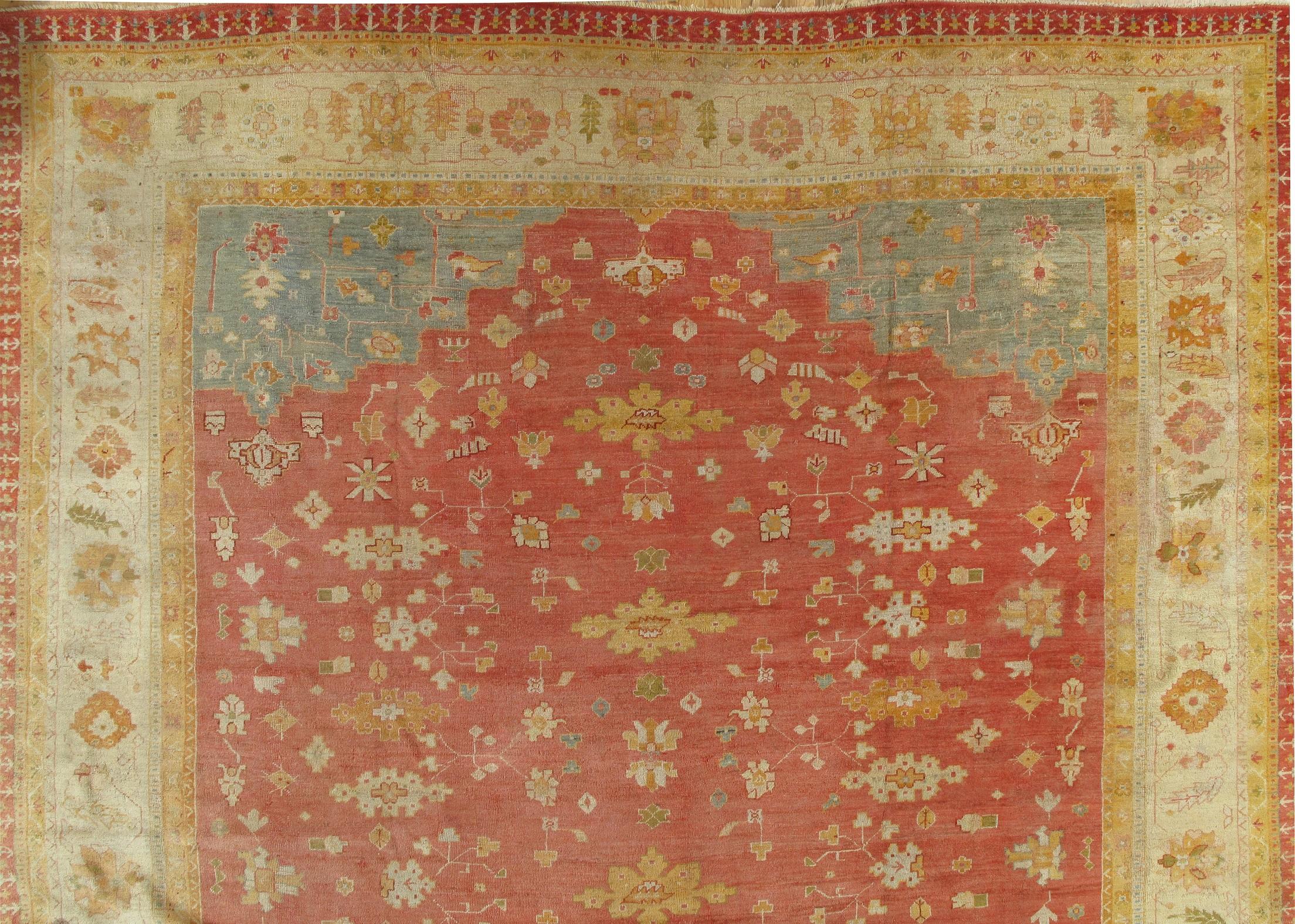 Antique Turkish Oushak carpets made in the late 19th century are renowned for their exquisite craftsmanship, intricate designs, and stunning color palettes. These carpets were handwoven in the Oushak region of Turkey, which has a rich tradition of