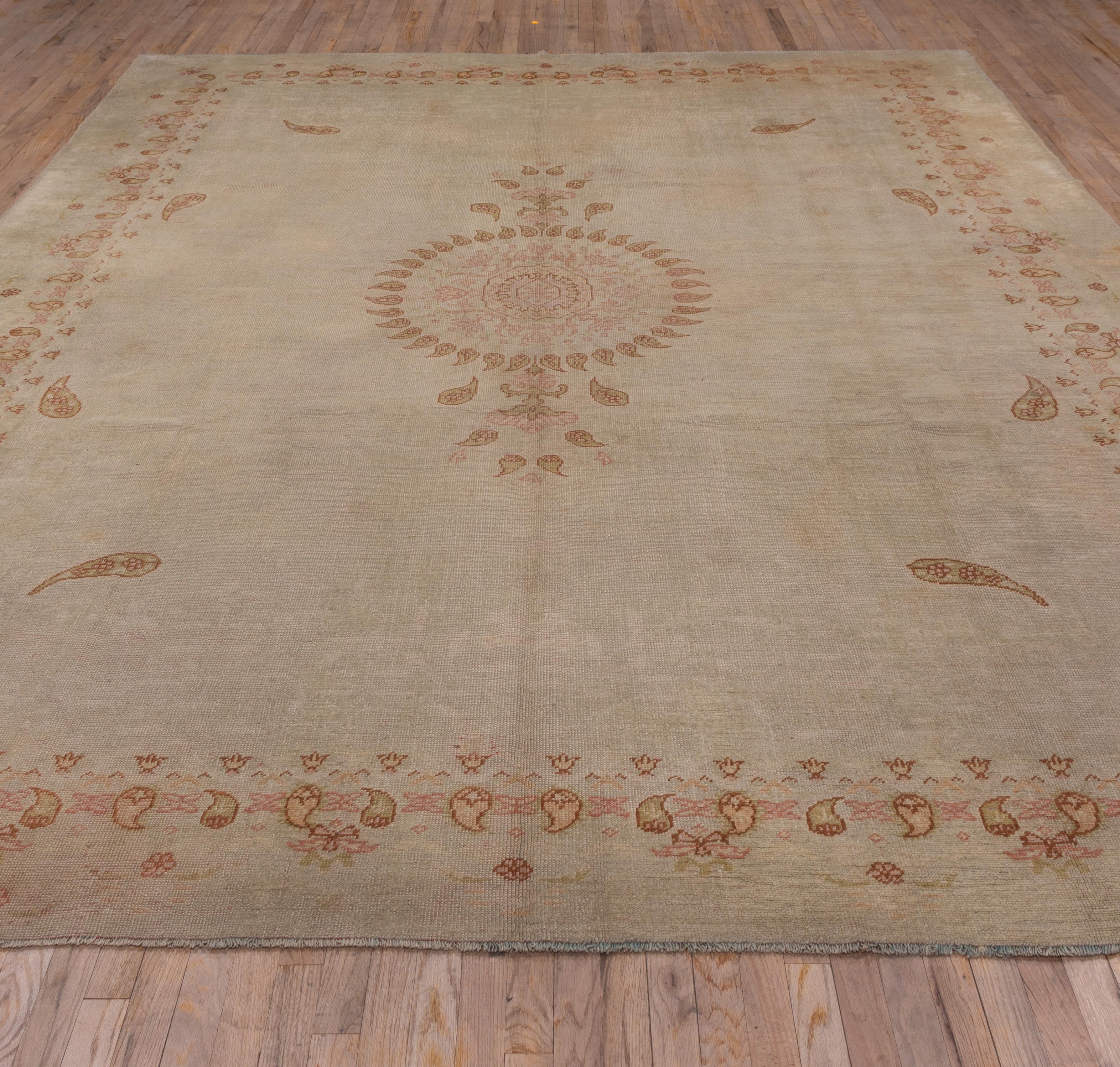 Early 20th Century Antique Oushak Carpet, Ivory Field, Orange Accents, circa 1920s For Sale