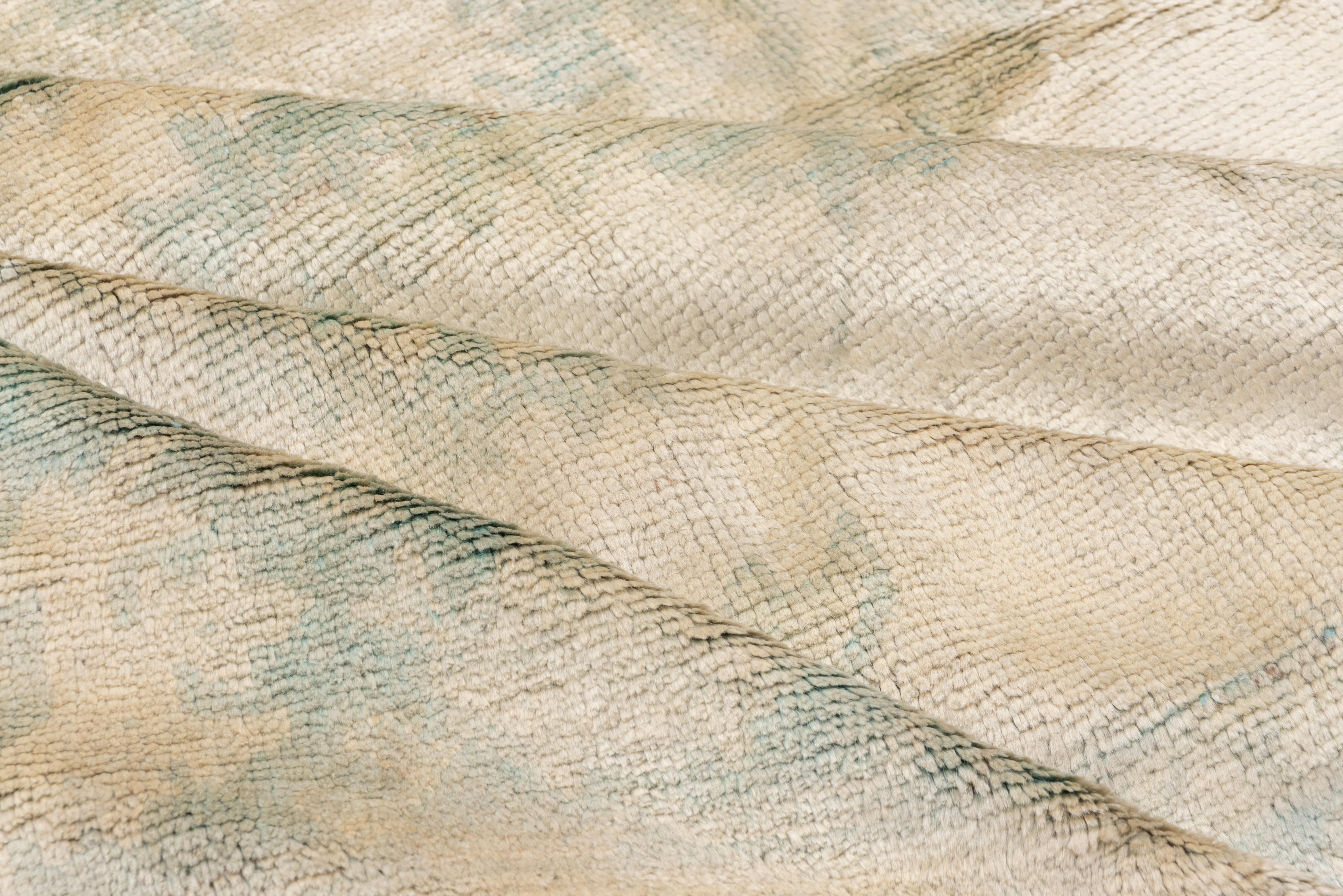 Turc Tapis antique Oushak:: champ ivoire:: bordures turquoises