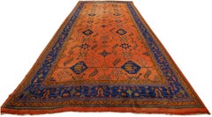 Antiker Oushak-Teppich, Orientteppich, handgefertigter Teppich, safranfarben, königsblau und Koralle
