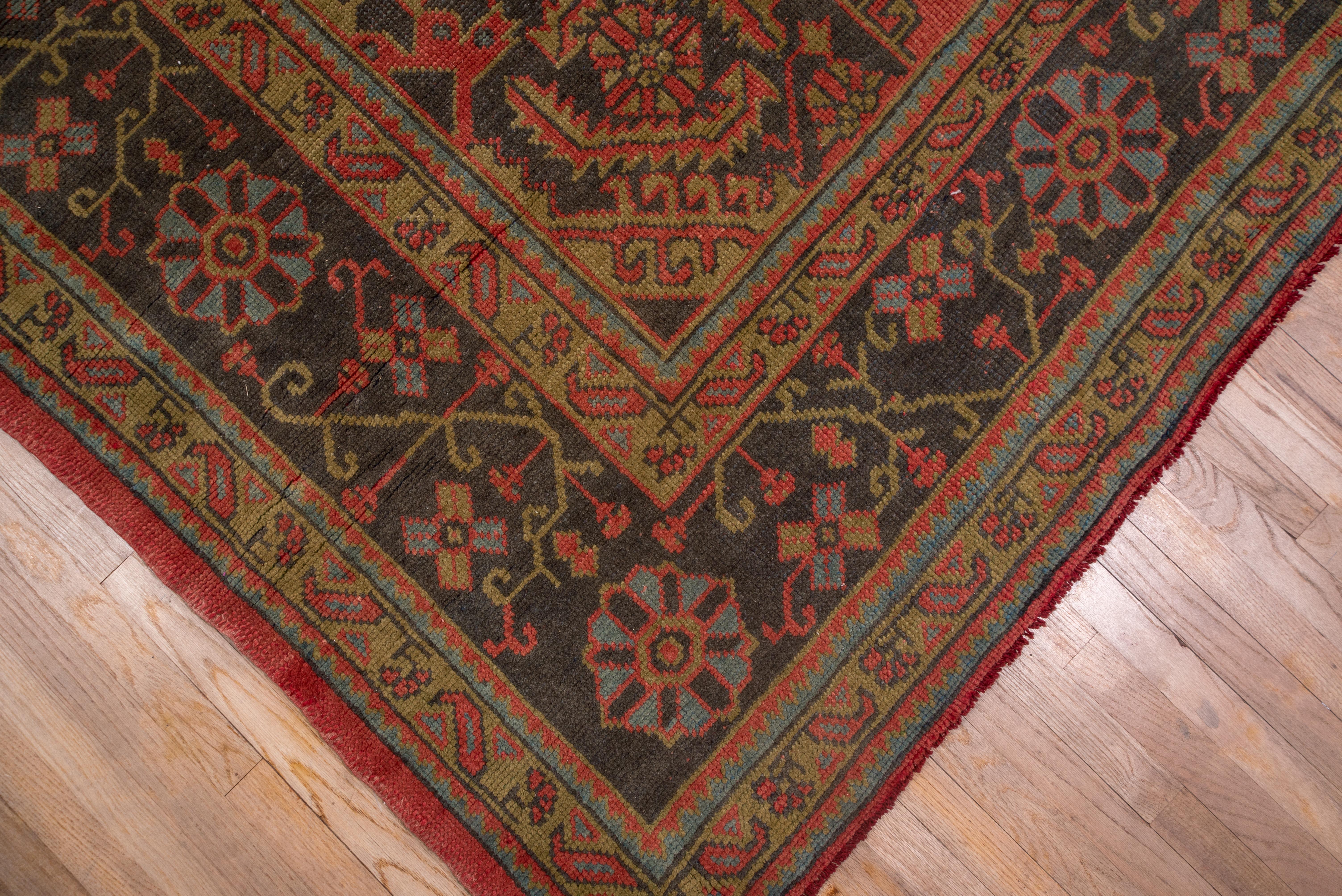 Early 20th Century Antique Oushak Carpet, Salmon Field, circa 1900 For Sale