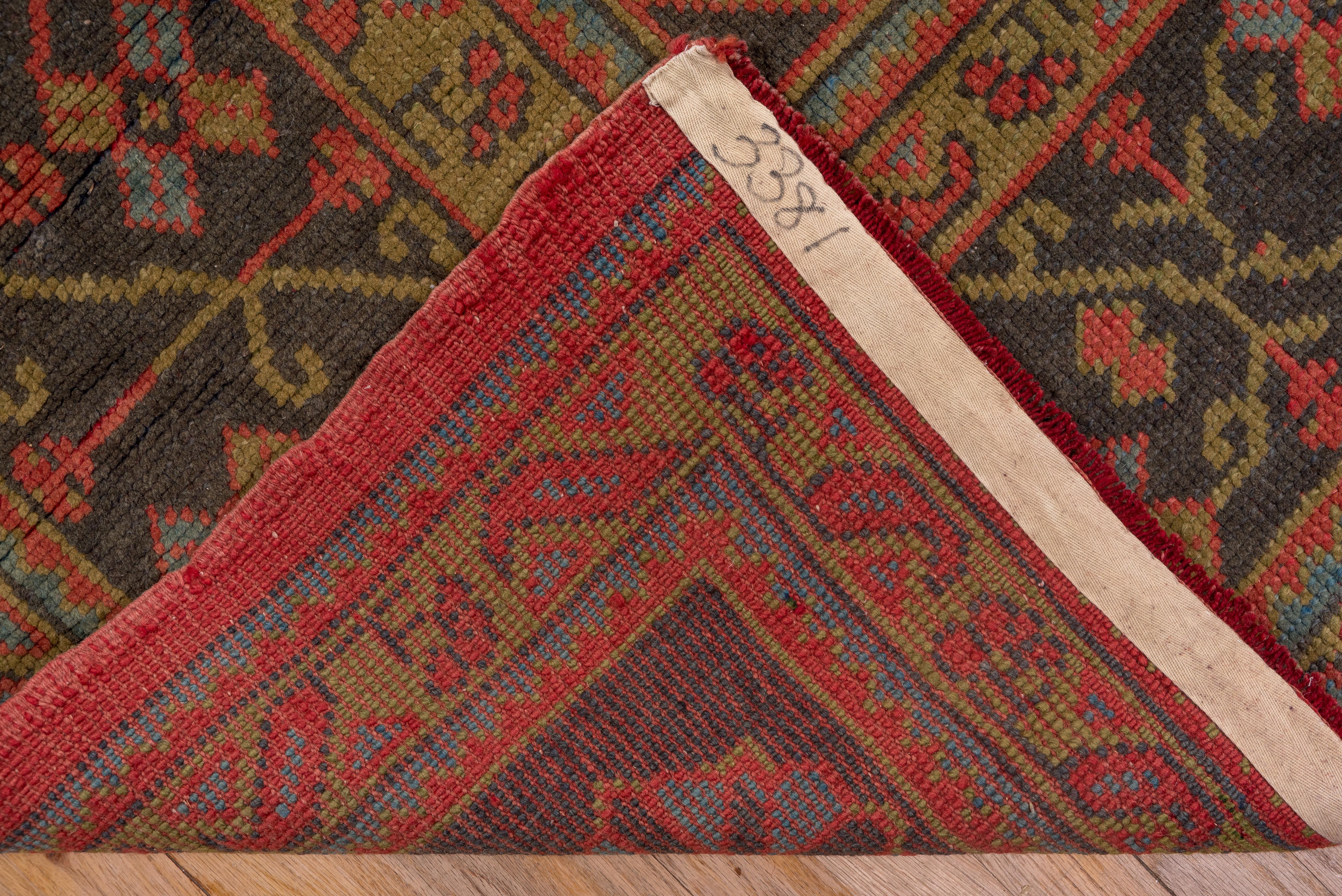 Wool Antique Oushak Carpet, Salmon Field, circa 1900 For Sale