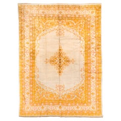 Antique Oushak Carpet with Bright Gold Medallion