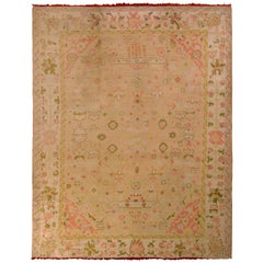 Antiker Oushak-Blumenteppich in Grün, Rosa und Creme mit All-Over-Muster