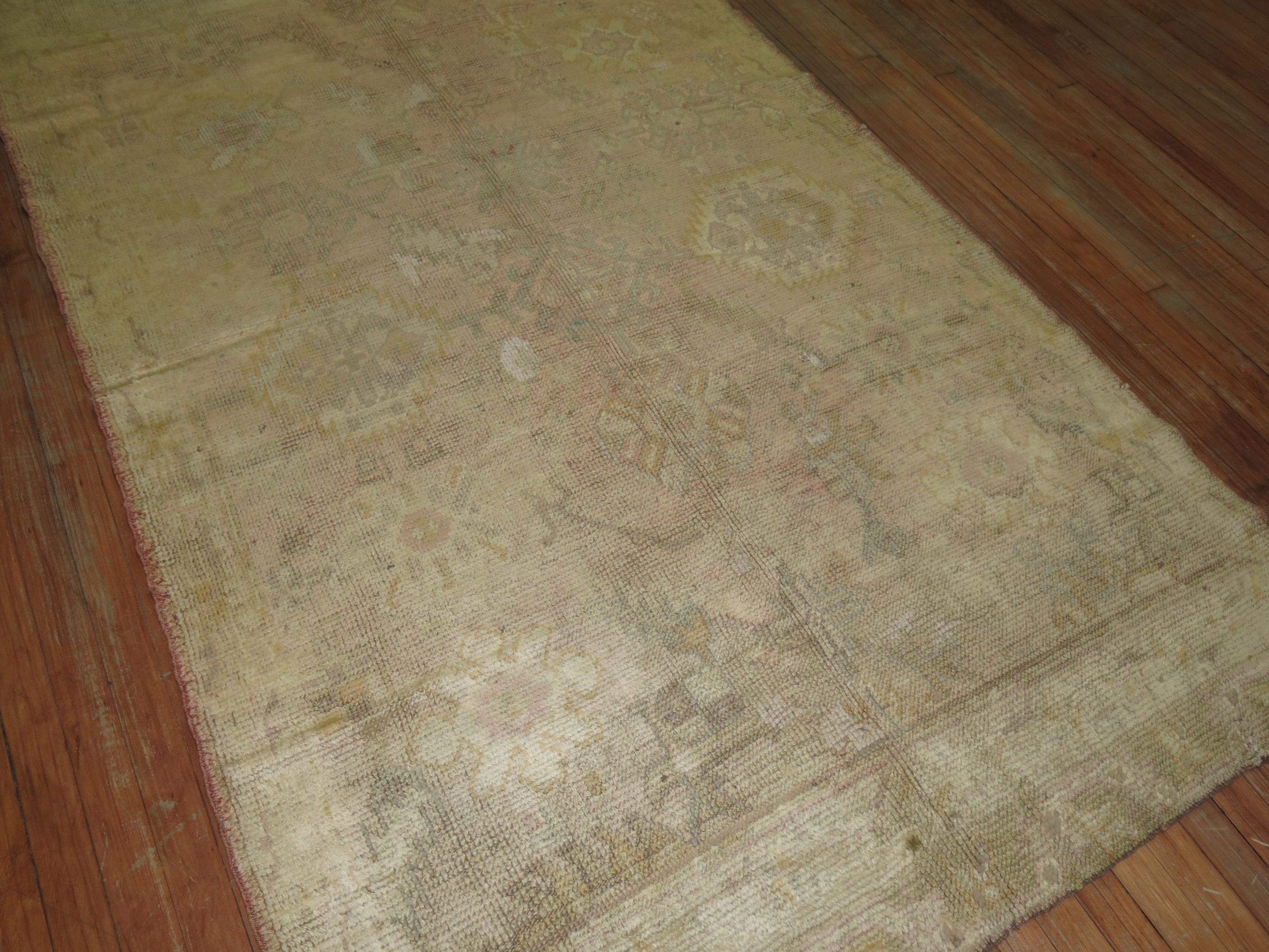 Hand-Woven Antique Oushak Pale Rug For Sale