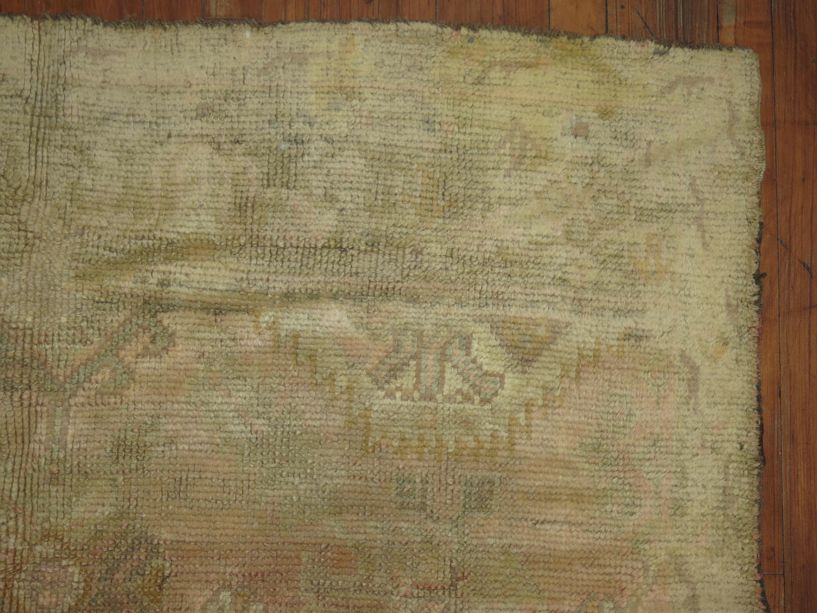 Mid-20th Century Antique Oushak Pale Rug For Sale