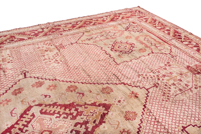 Antique Oushak Pink and Red Wool Rug For Sale at 1stDibs