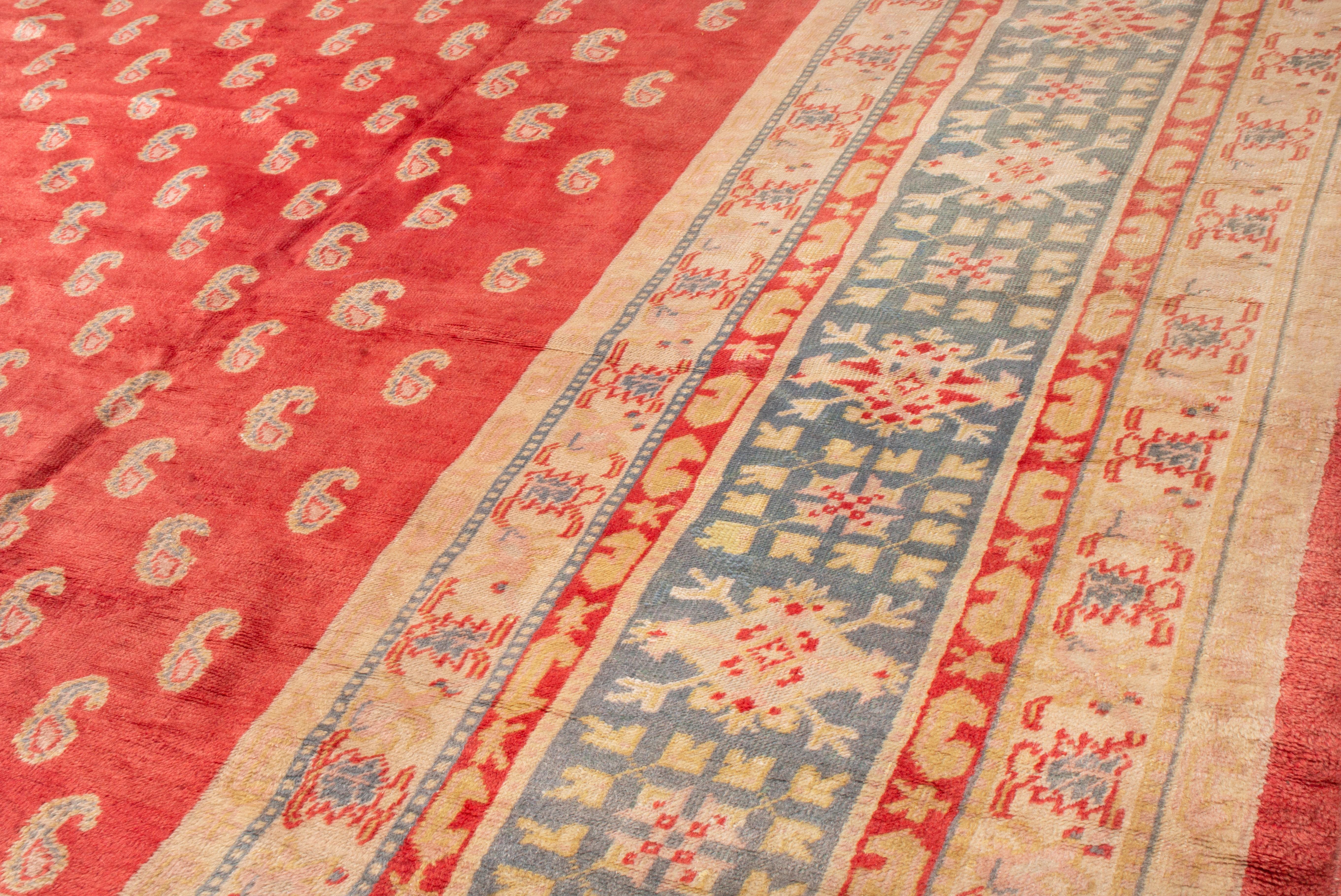 Hand-Knotted Antique Oushak Red and Beige Wool Rug with Paisleys