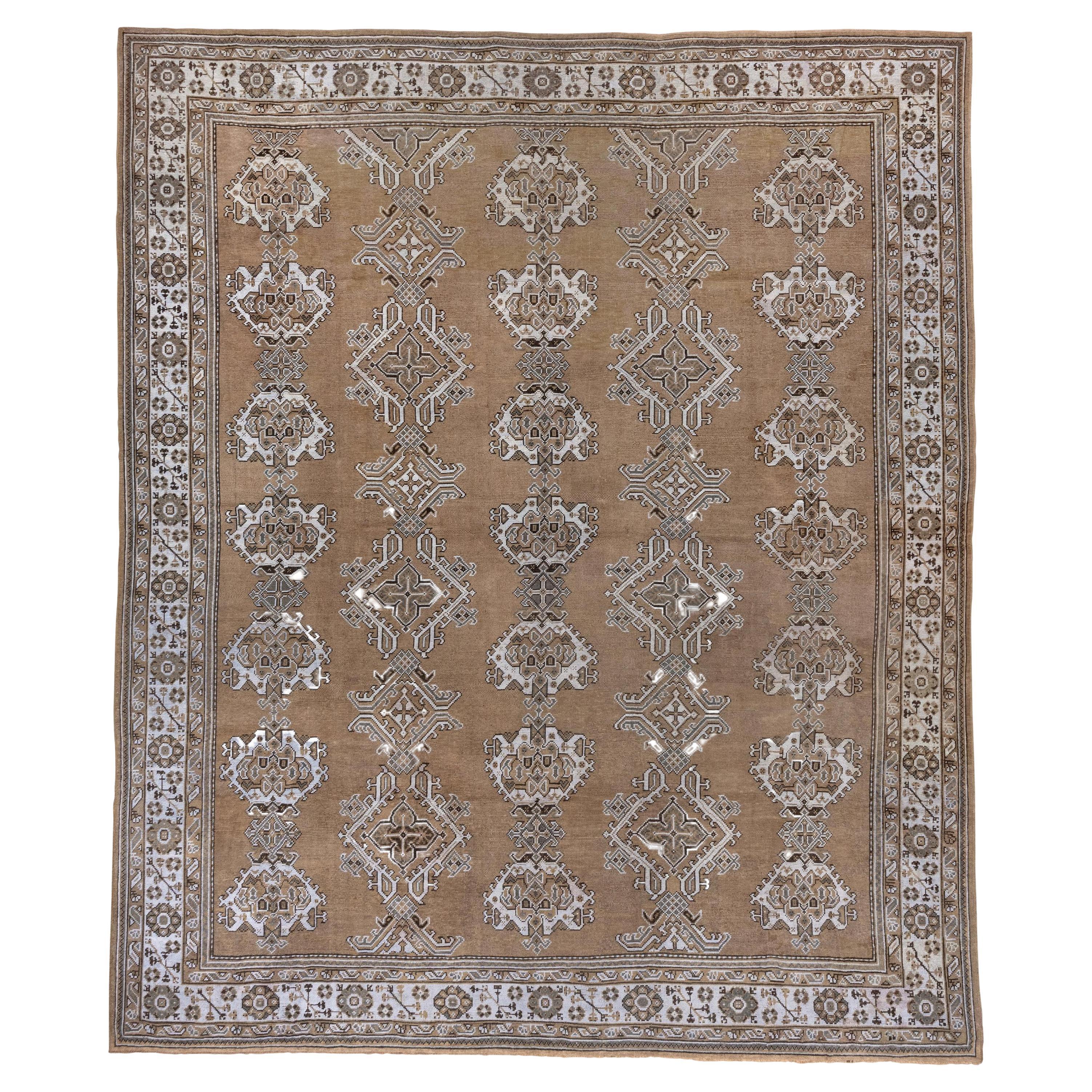 Antique Oushak Rug, Brown Field, Light Blue Borders and Motifs