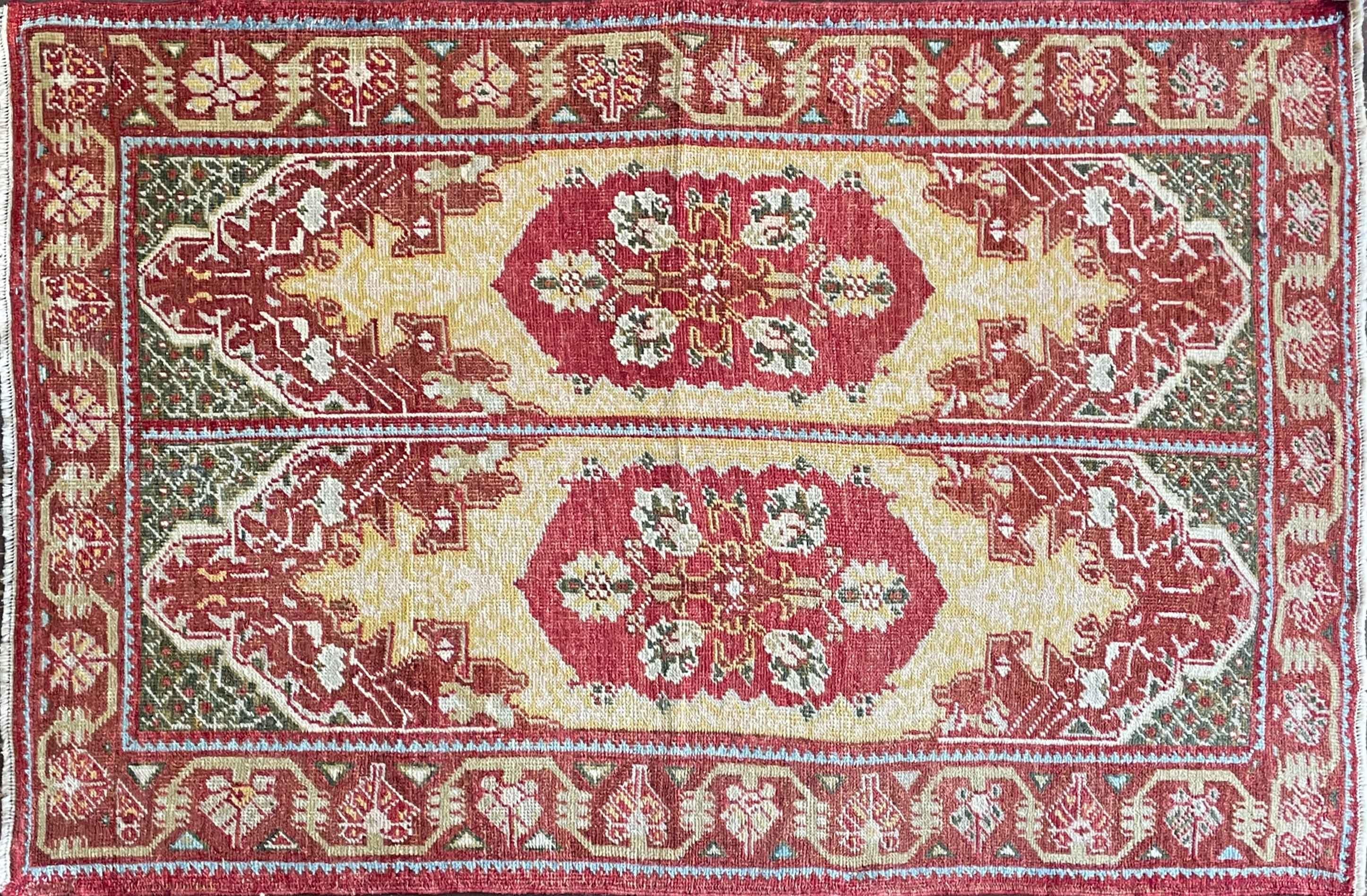 
Step into the captivating allure of an antique Turkish Oushak rug, measuring a stunning 4'4