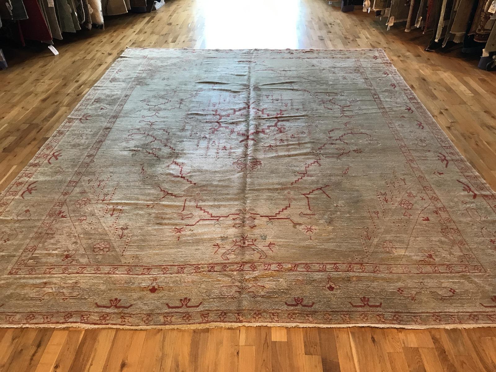 Hand-Knotted Antique Oushak Rug For Sale