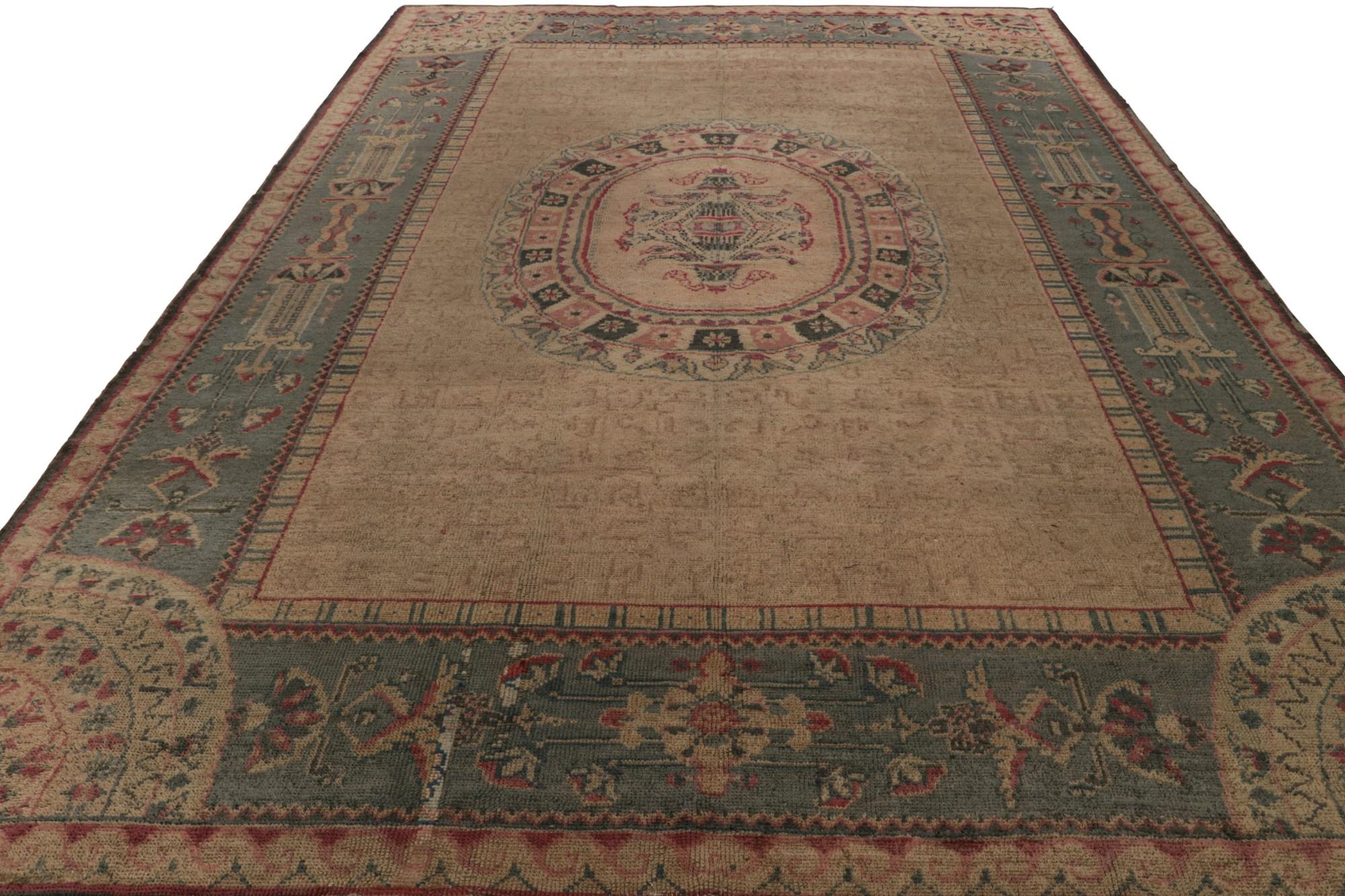 Turkish Antique Oushak Rug in Brown with Blue Floral Patterns For Sale