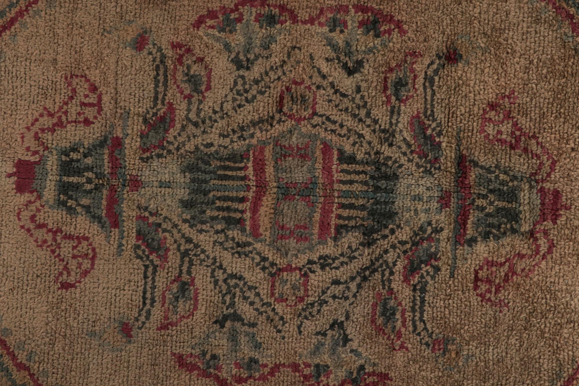 Early 20th Century Antique Oushak Rug in Brown with Blue Floral Patterns For Sale
