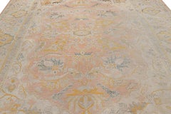 Antique Oushak Rug in Pink with Blue and Gold Floral Patterns