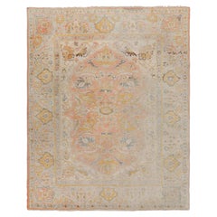 Tappeto antico Oushak in rosa con motivi floreali blu e oro