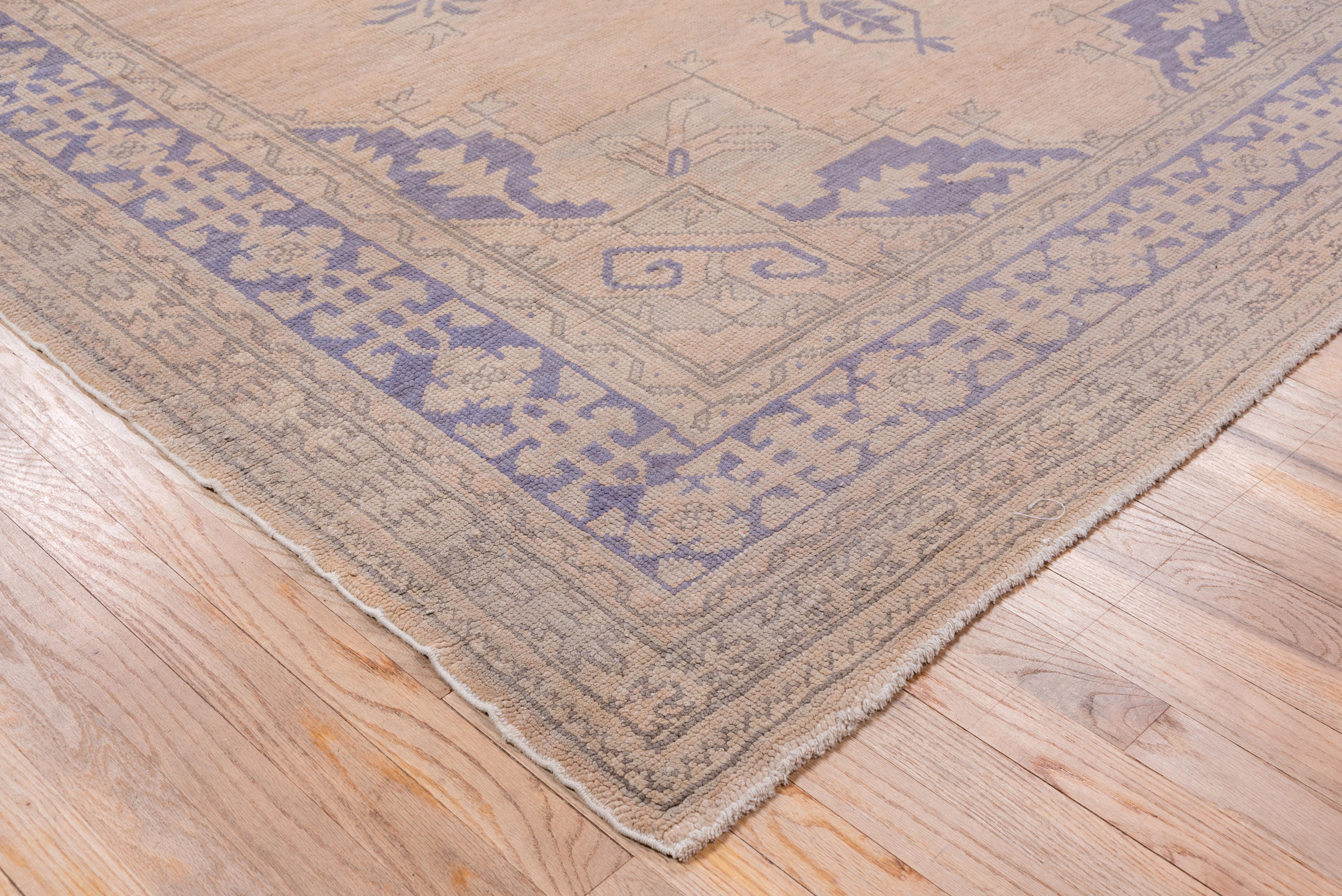 Early 20th Century Antique Oushak Rug with a Light Palette For Sale
