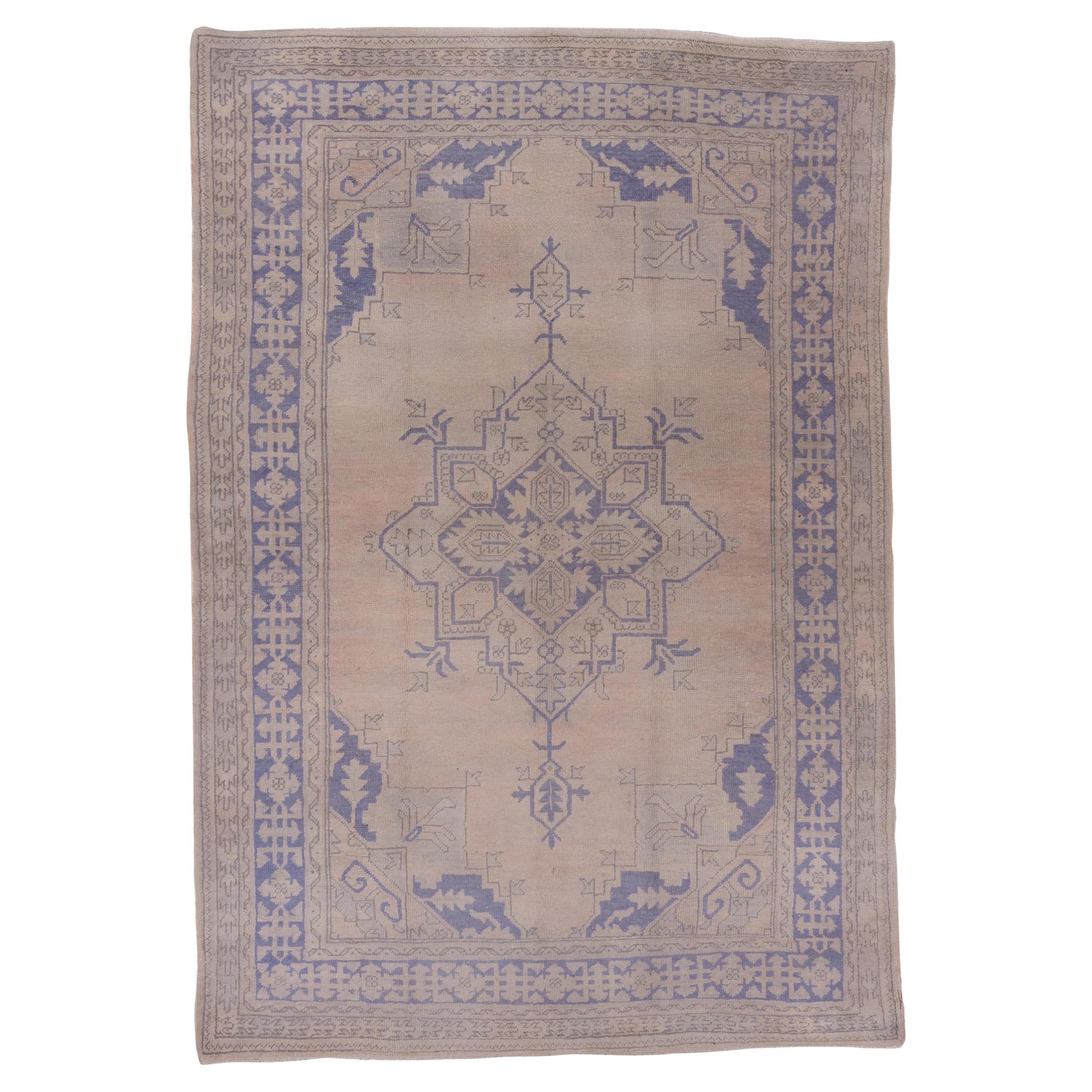 Antique Oushak Rug with a Light Palette For Sale