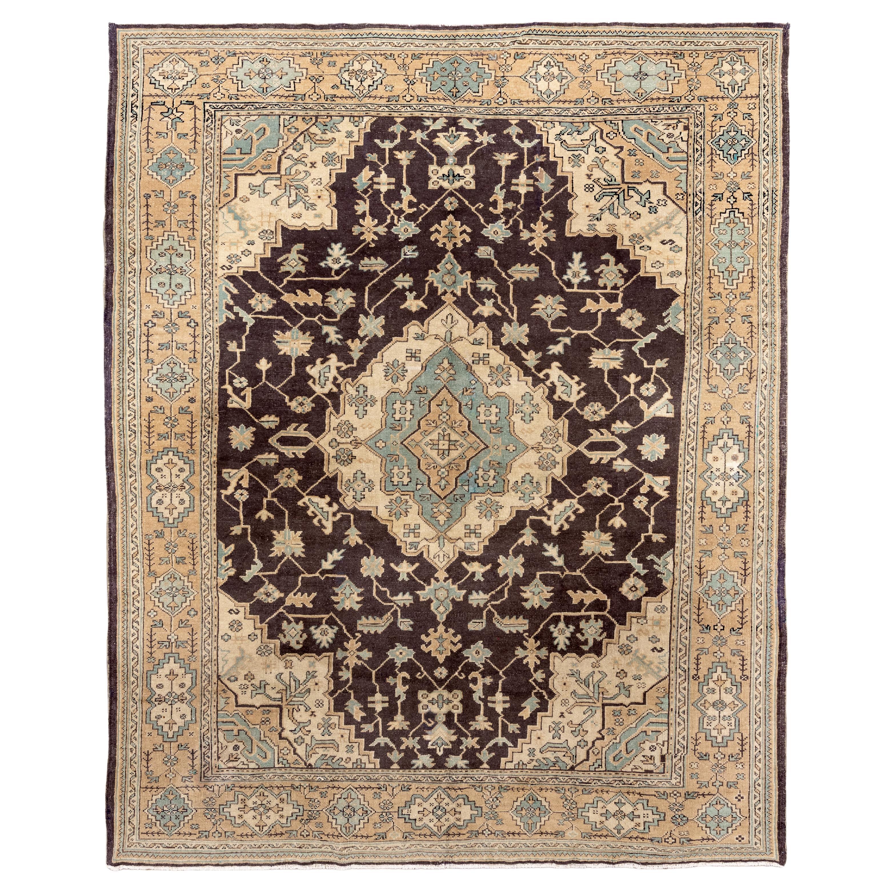 Antique Oushak Rug with Bold Medallion and Soft Earth Tones