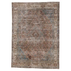 Antique Oushak Rug with Diamond Medallion and Subtle Earth Tones