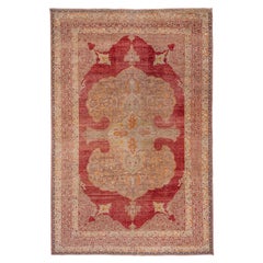 Antique Oushak Rug with Red Central Medallion