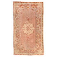 Antique Oushak Rug with Red Pink Tones