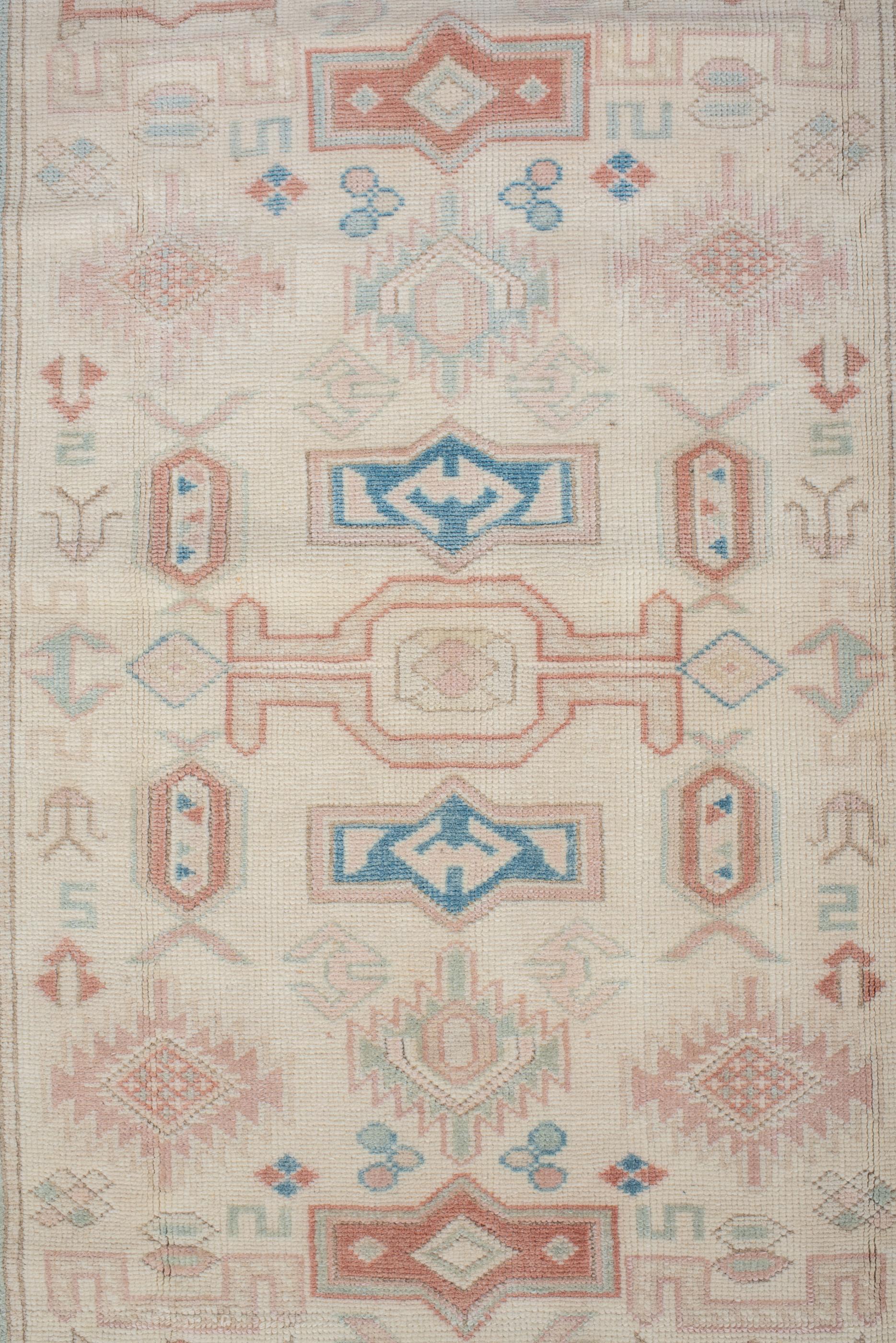Hand-Knotted Antique Oushak Rug with Soft Palette For Sale