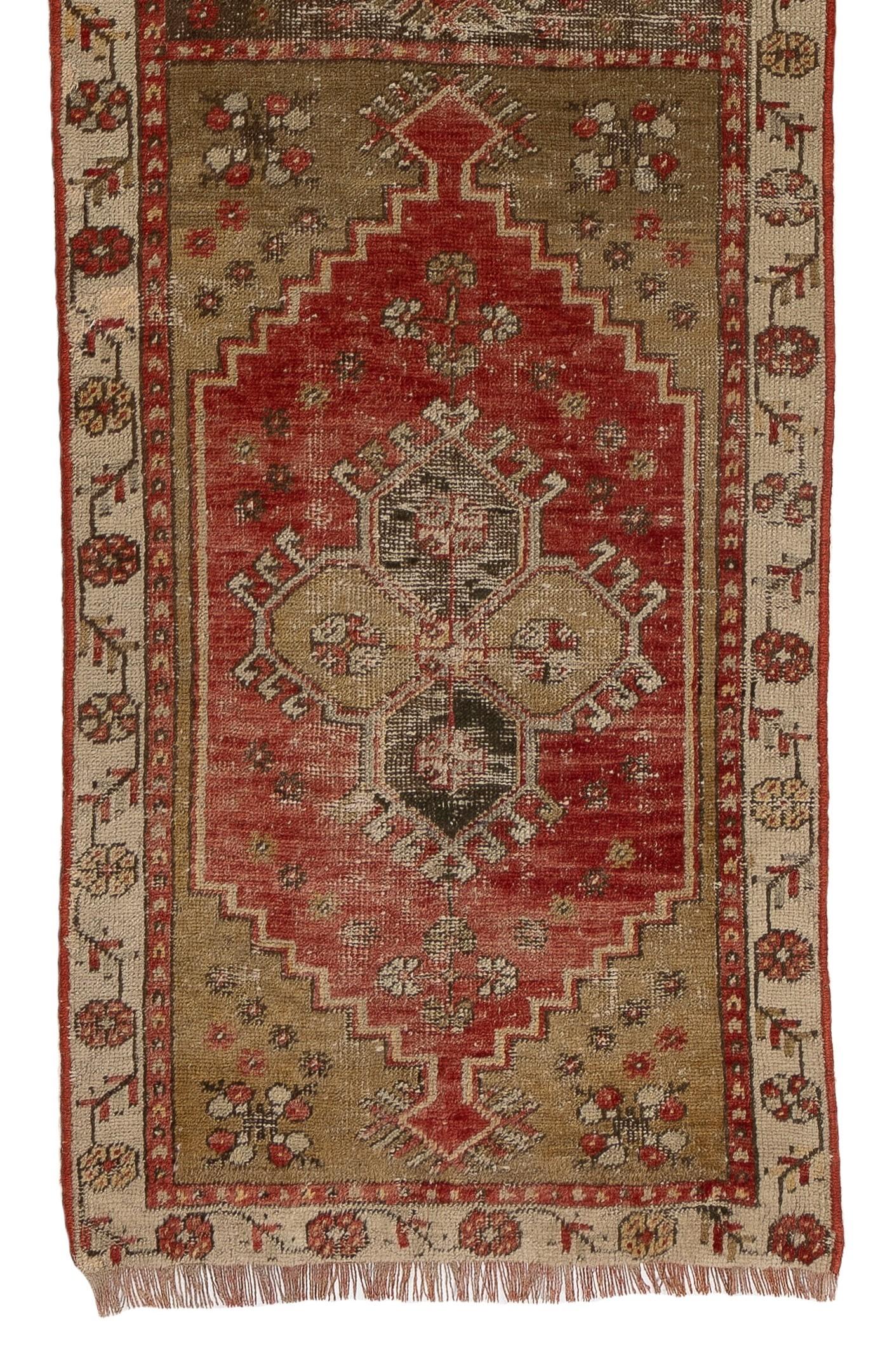 An early 20th century hand knotted runner from Central Anatolia with pleasing natural colors and wool pile on wool foundation. Good condition, minor wear in line with age, sturdy and as clean as a brand new rug.