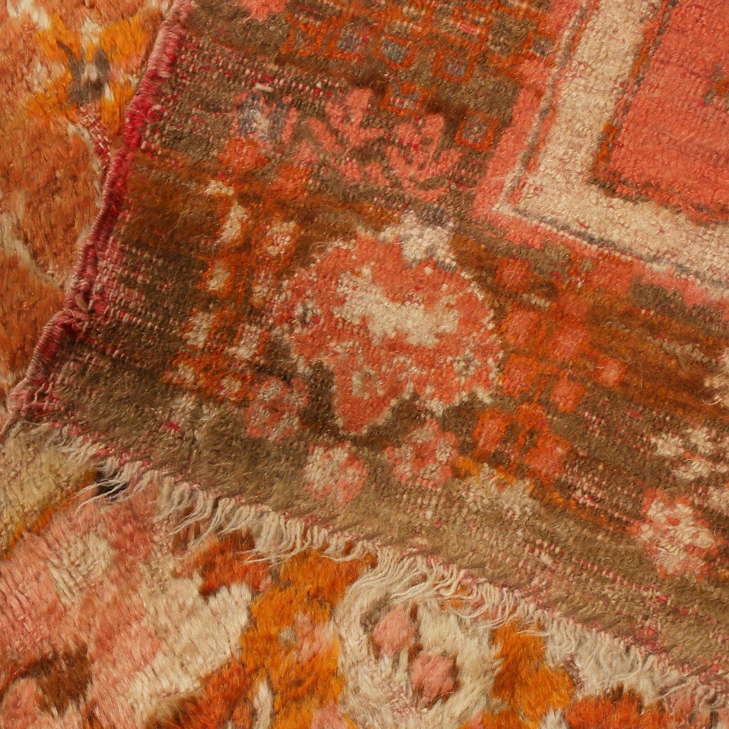 Late 19th Century Antique Oushak Rug in Orange with Pink Floral Patterns For Sale