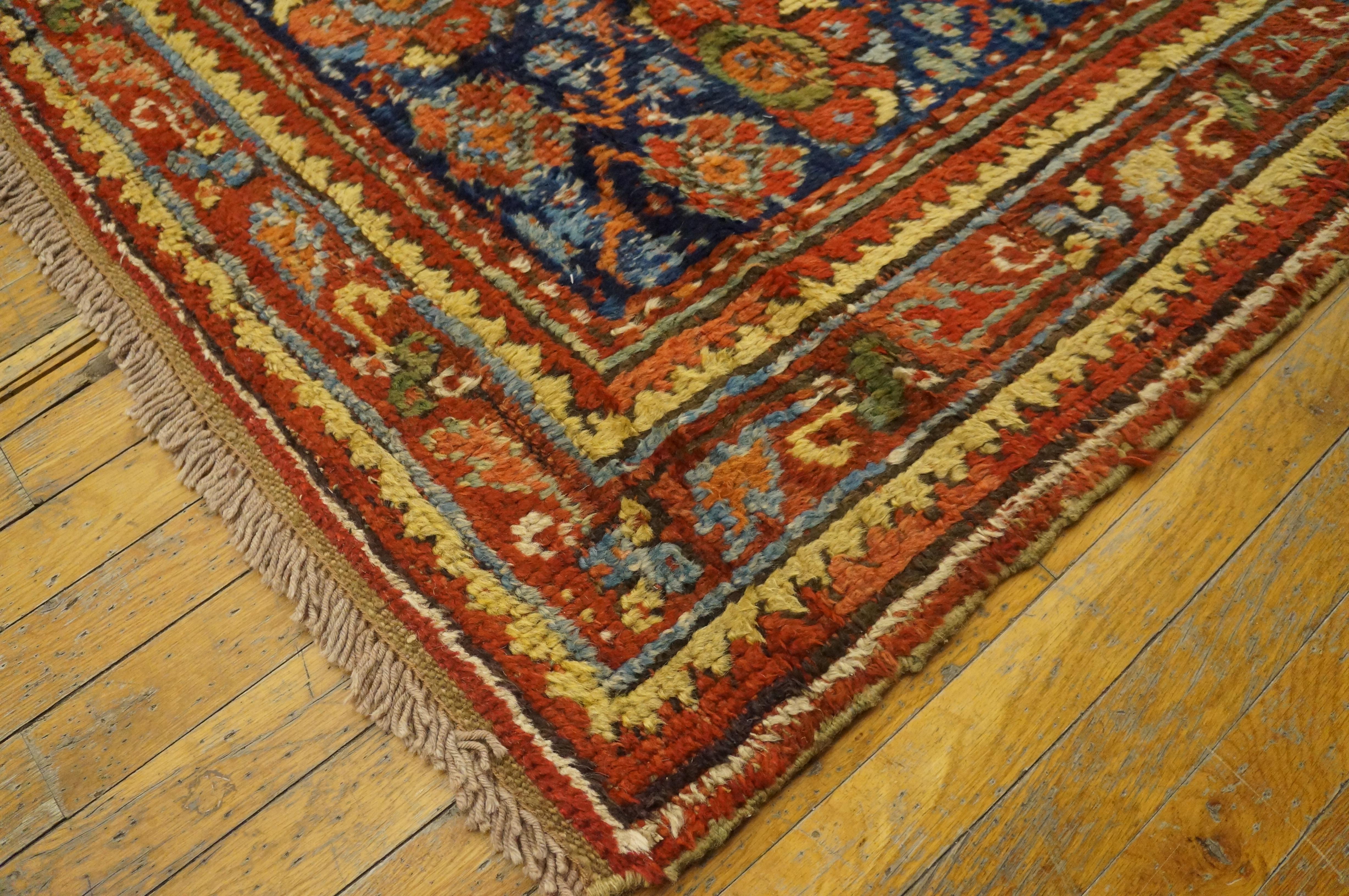 Antique Oushak rug. Measures: 15'6