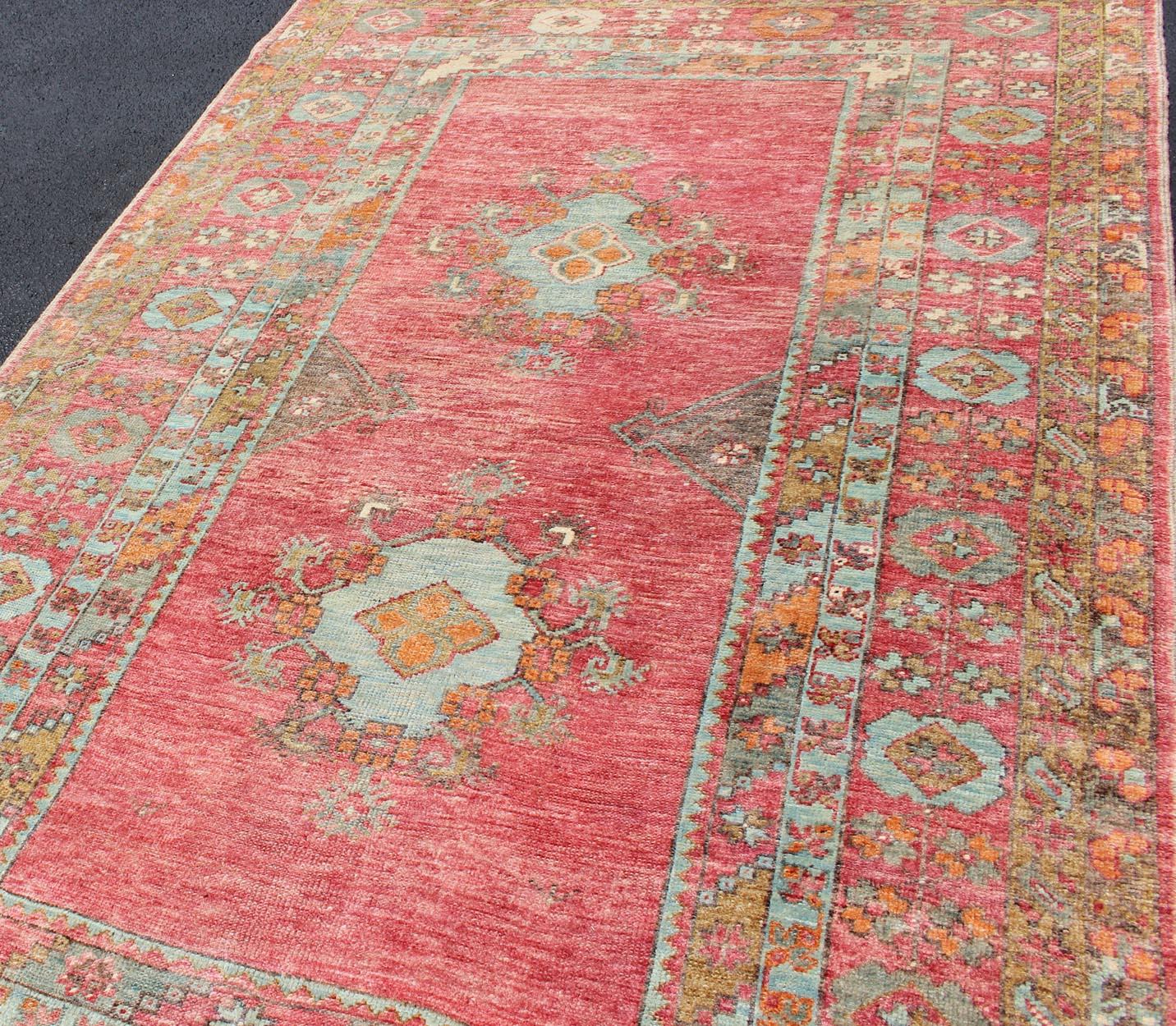 Mid-20th Century Antique Oushak with Coral Pink, Orange, Gray, Taupe Light Brown & Light Blue  For Sale