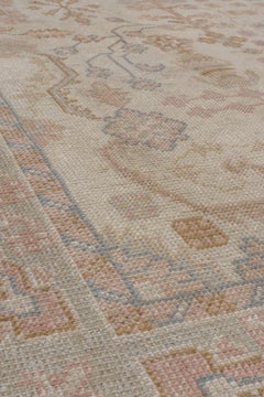 Antique Oushak with Elaborate Floral Stemming