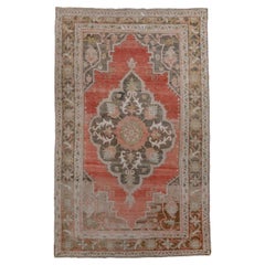 Antique Oushak with Red Field and Center Medallion 