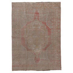 Antique Oushak with Soft Tones and Floral Design